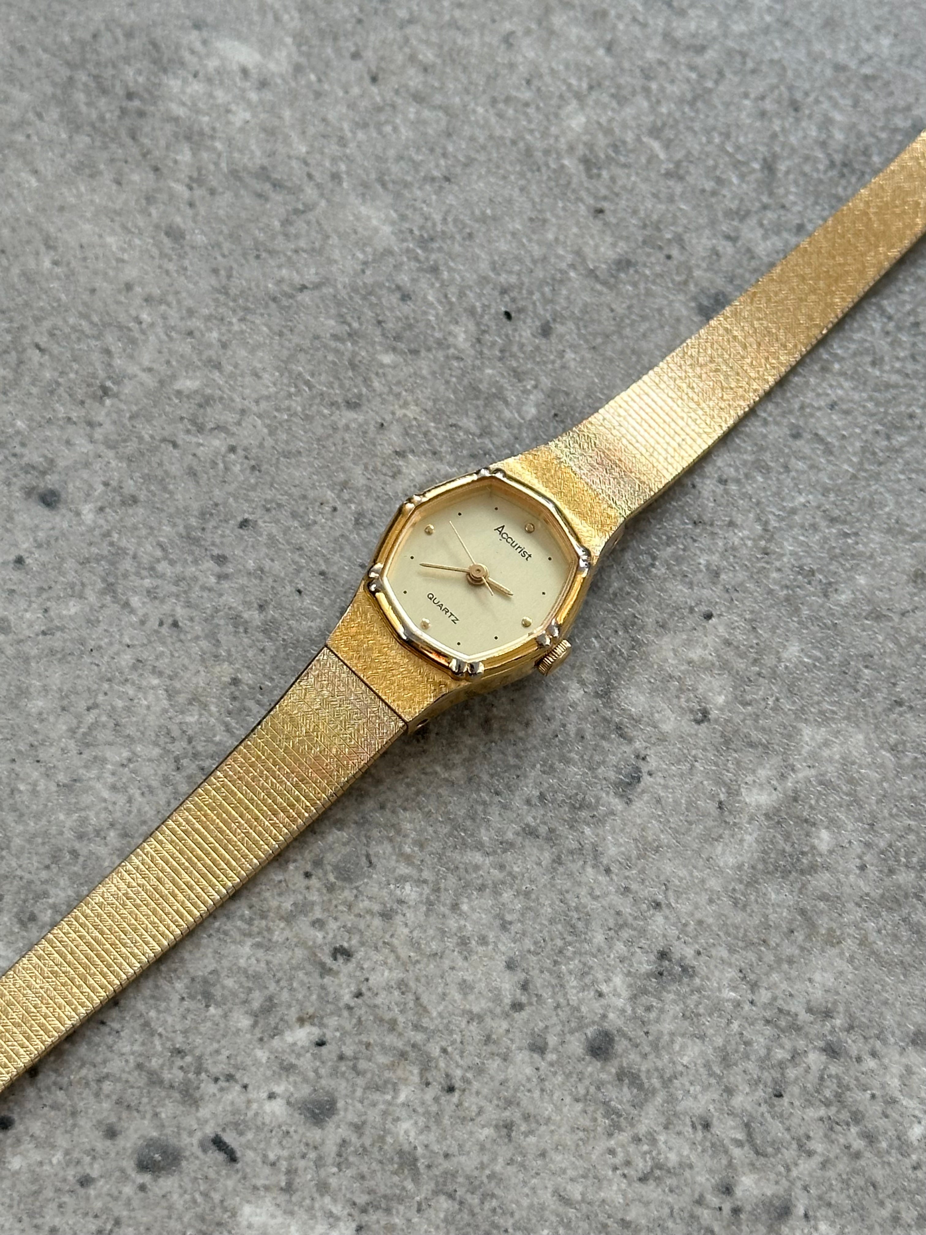 Accurist 1990s gold-tone octagonal quartz watch with a sleek design and classic style.