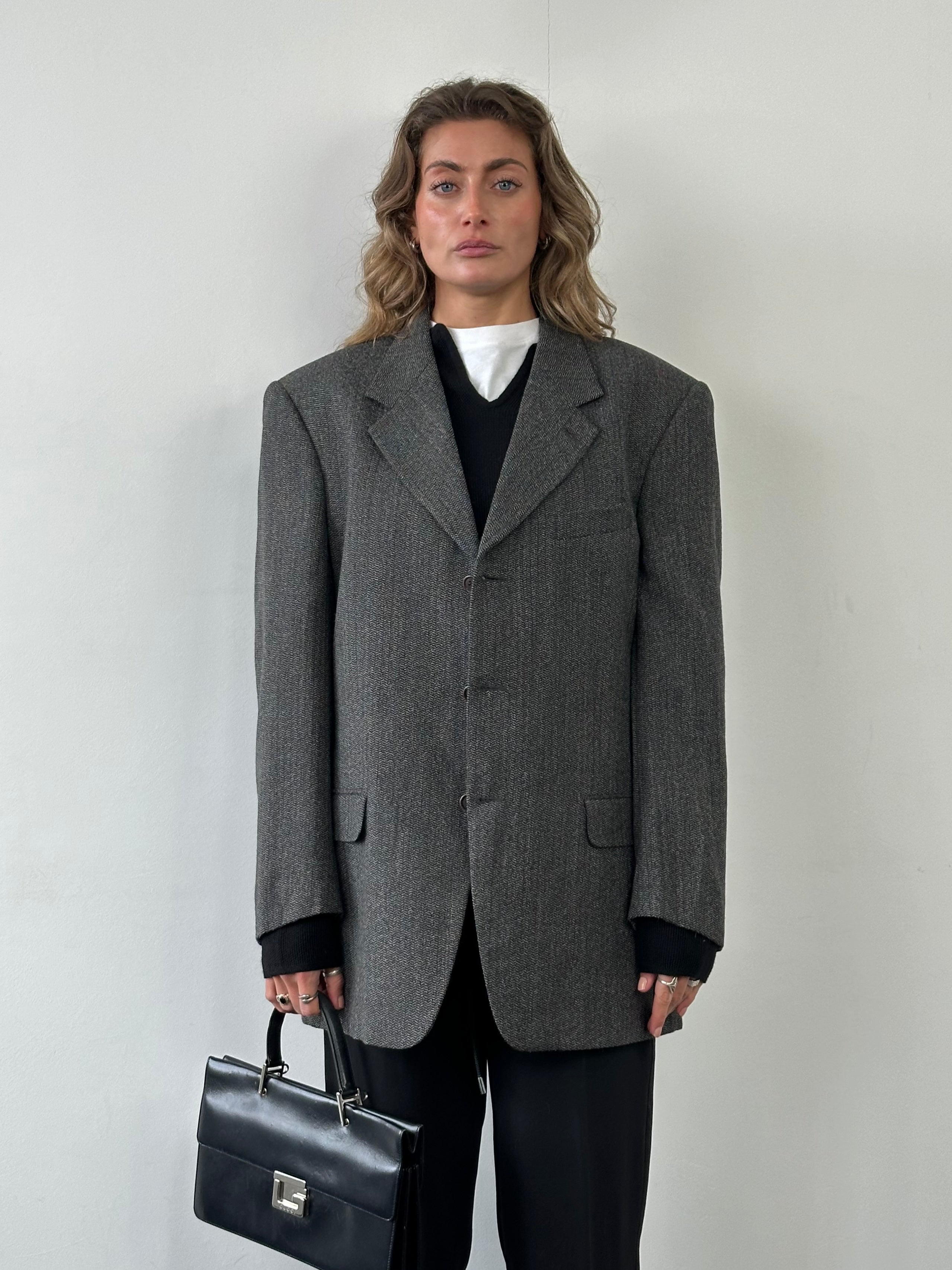 Valentino wool alpaca single-breasted blazer in size 42R/XL, tailored fit with classic lapel and button closure.