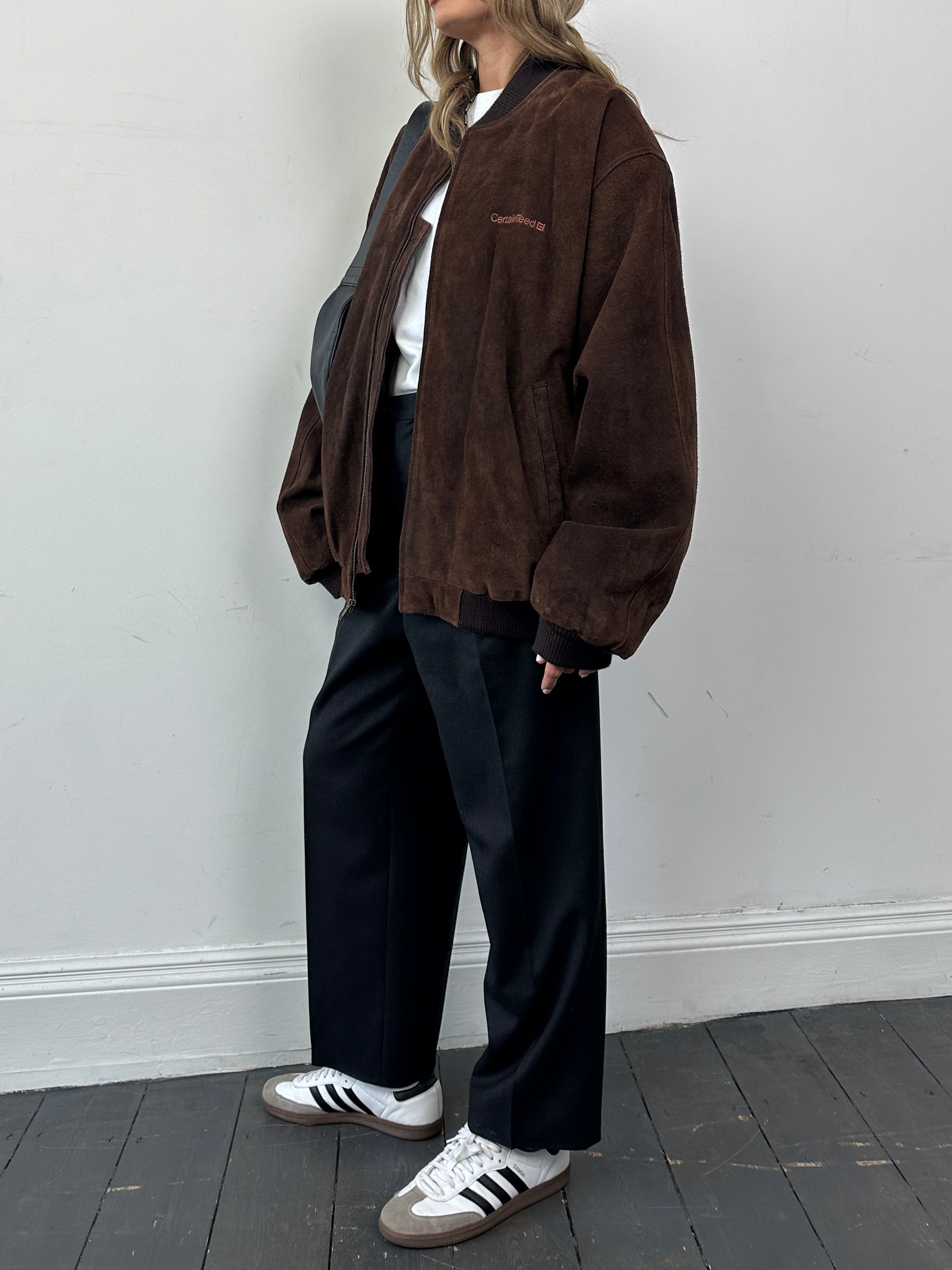 Vintage suede leather bomber jacket with embroidery in XXL size, featuring classic design and detailed stitching.