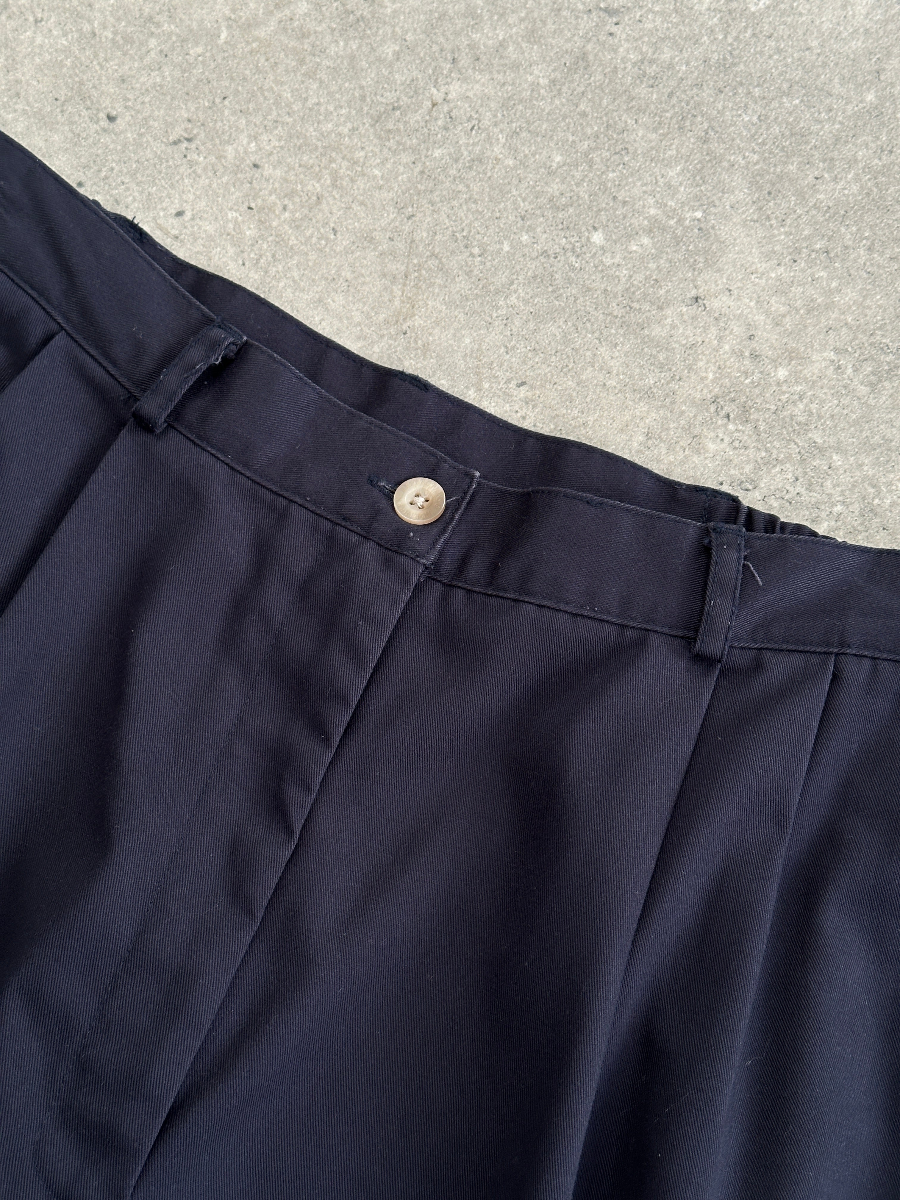Vintage pure cotton tapered leg pull-on trousers in size W28/30, shown in a classic denim style with a relaxed fit.