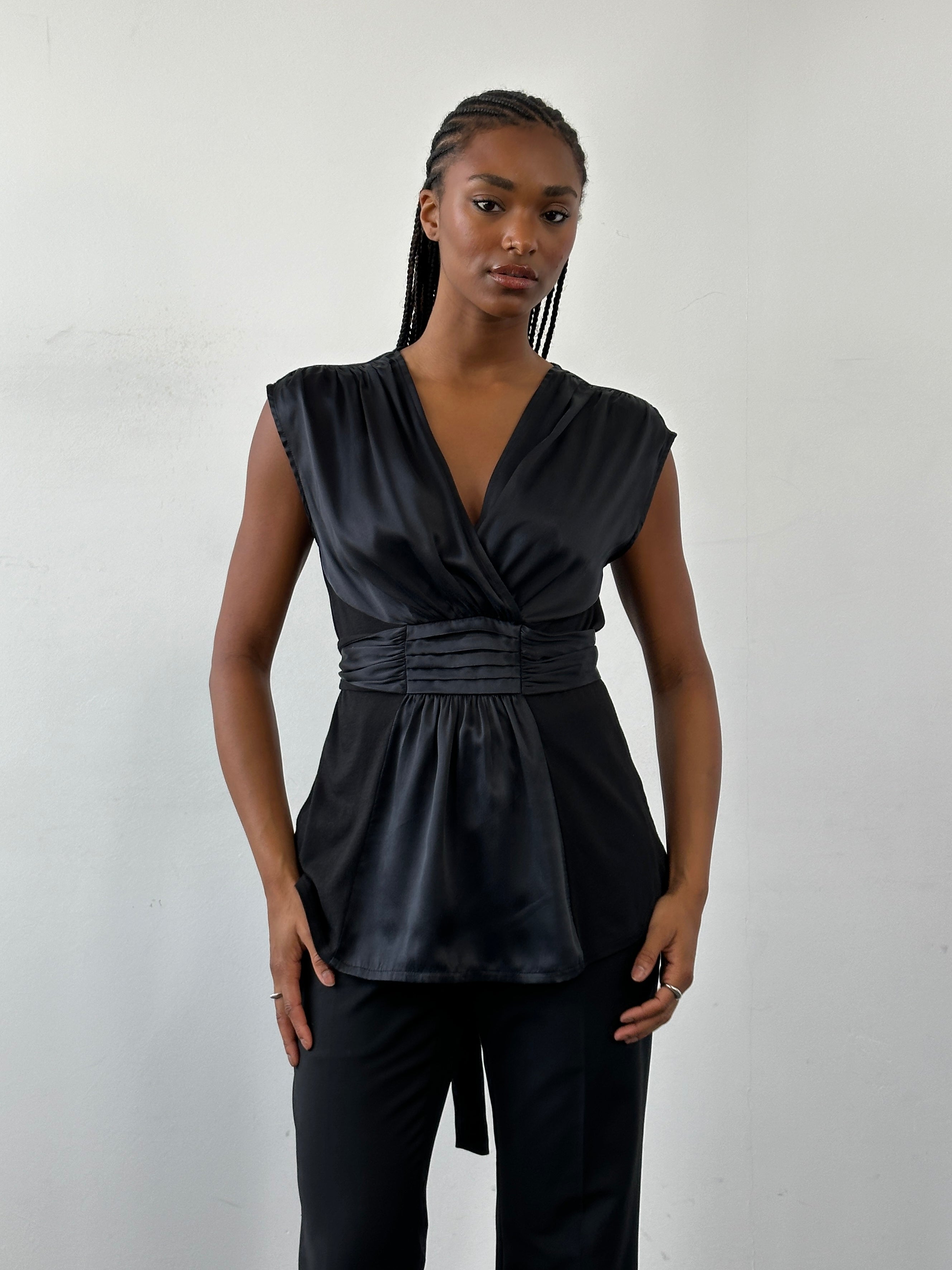 Jigsaw silk tie vest peplum top in size M, featuring a stylish sleeveless design with a tie detail at the neck.