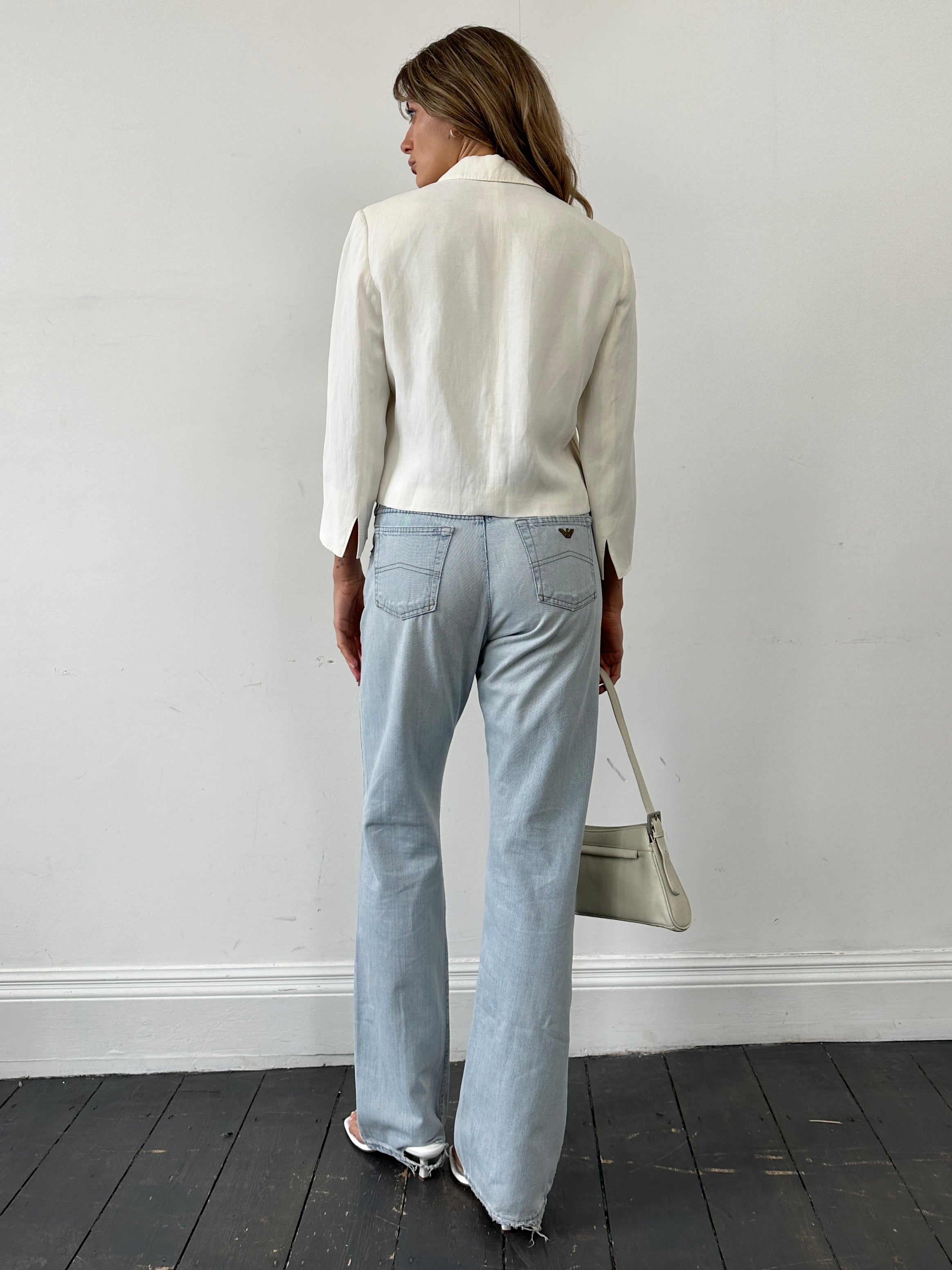 Armani Jeans light wash mid-rise denim jeans with classic five-pocket design and belt loops, size W30.