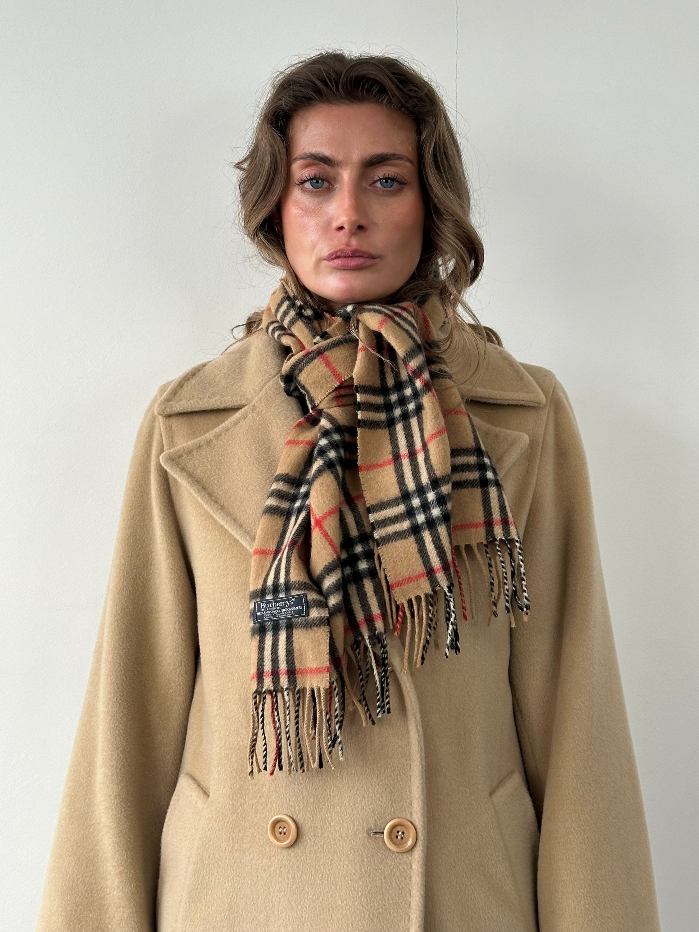 Burberry Lambswool Cashmere Nova Check scarf featuring classic check pattern in beige, black, and red tones.