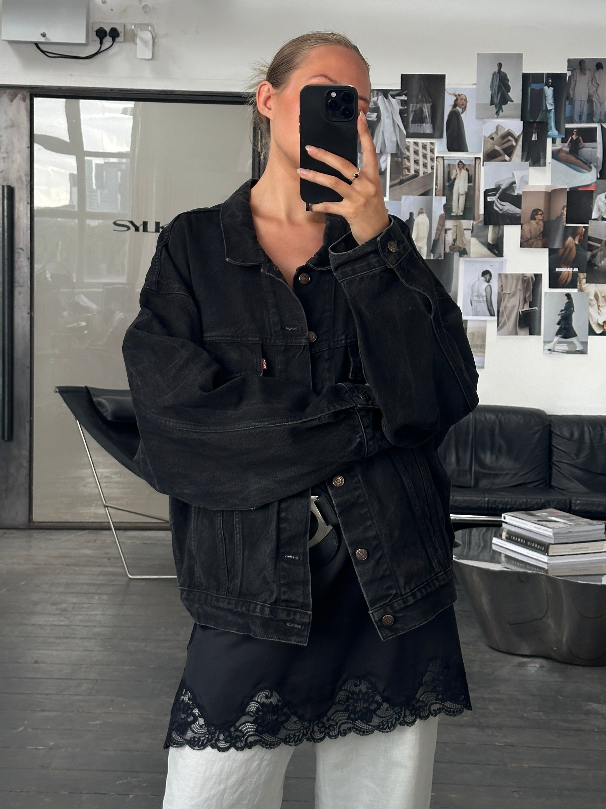 Levi’s 1990s washed denim jacket in XXL, showing a classic blue denim design with button closure and collar detail.