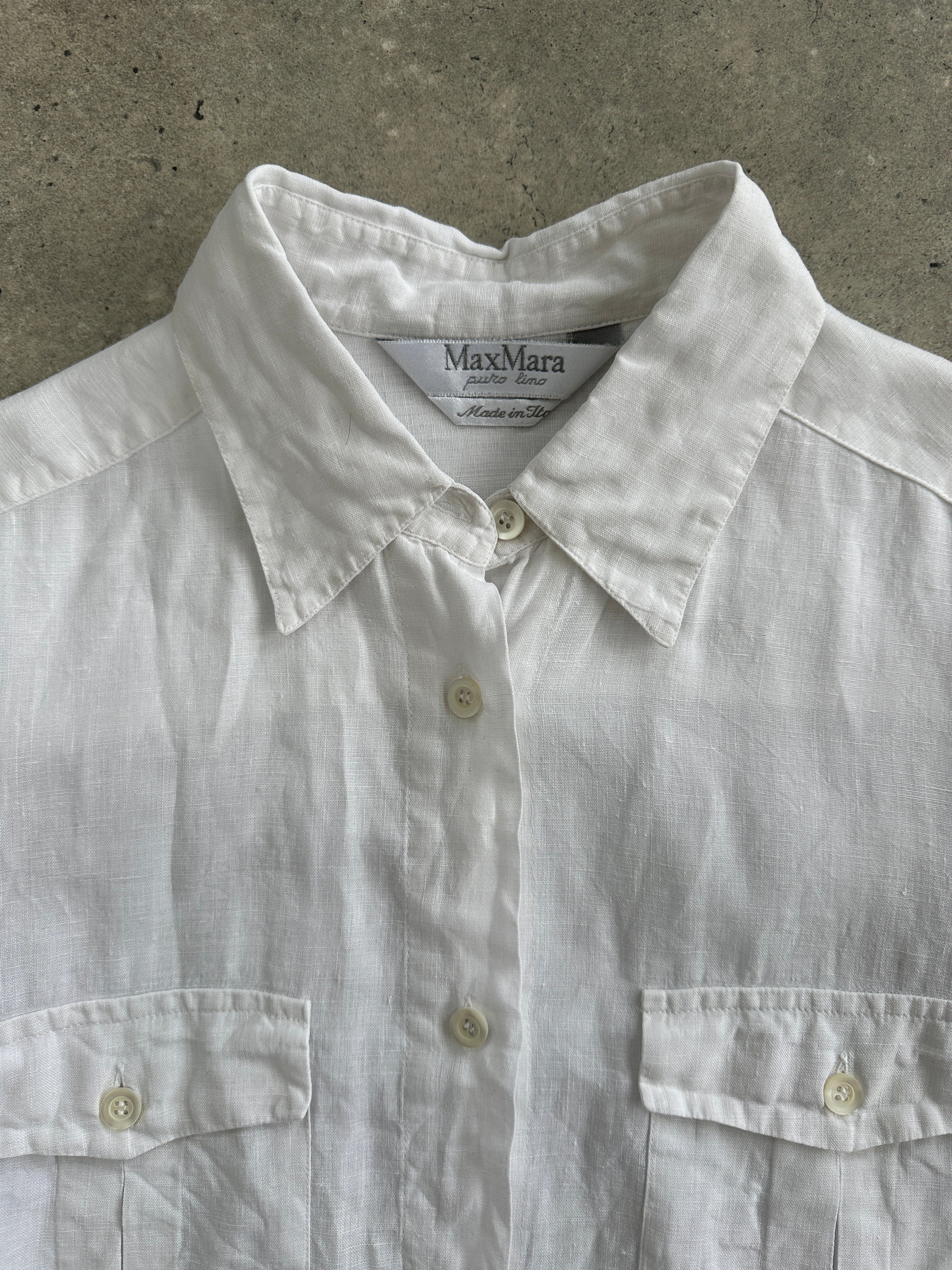 Max Mara pure linen shirt in size M/L, shown in a light, breathable fabric with a classic collar and button front design.
