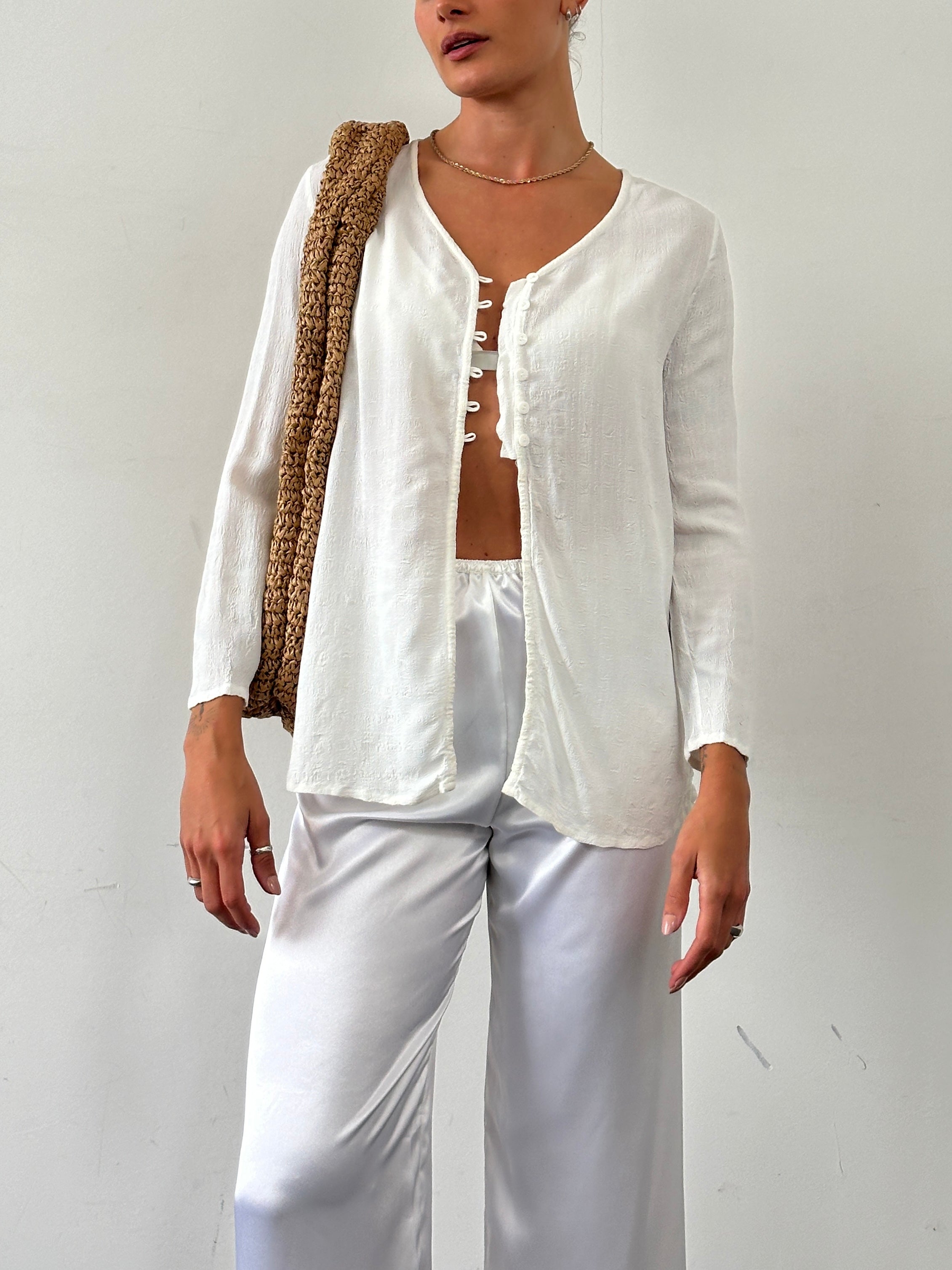 Laura Ashley textured collarless shirt in size M, featuring a stylish design with a soft fabric and modern fit.