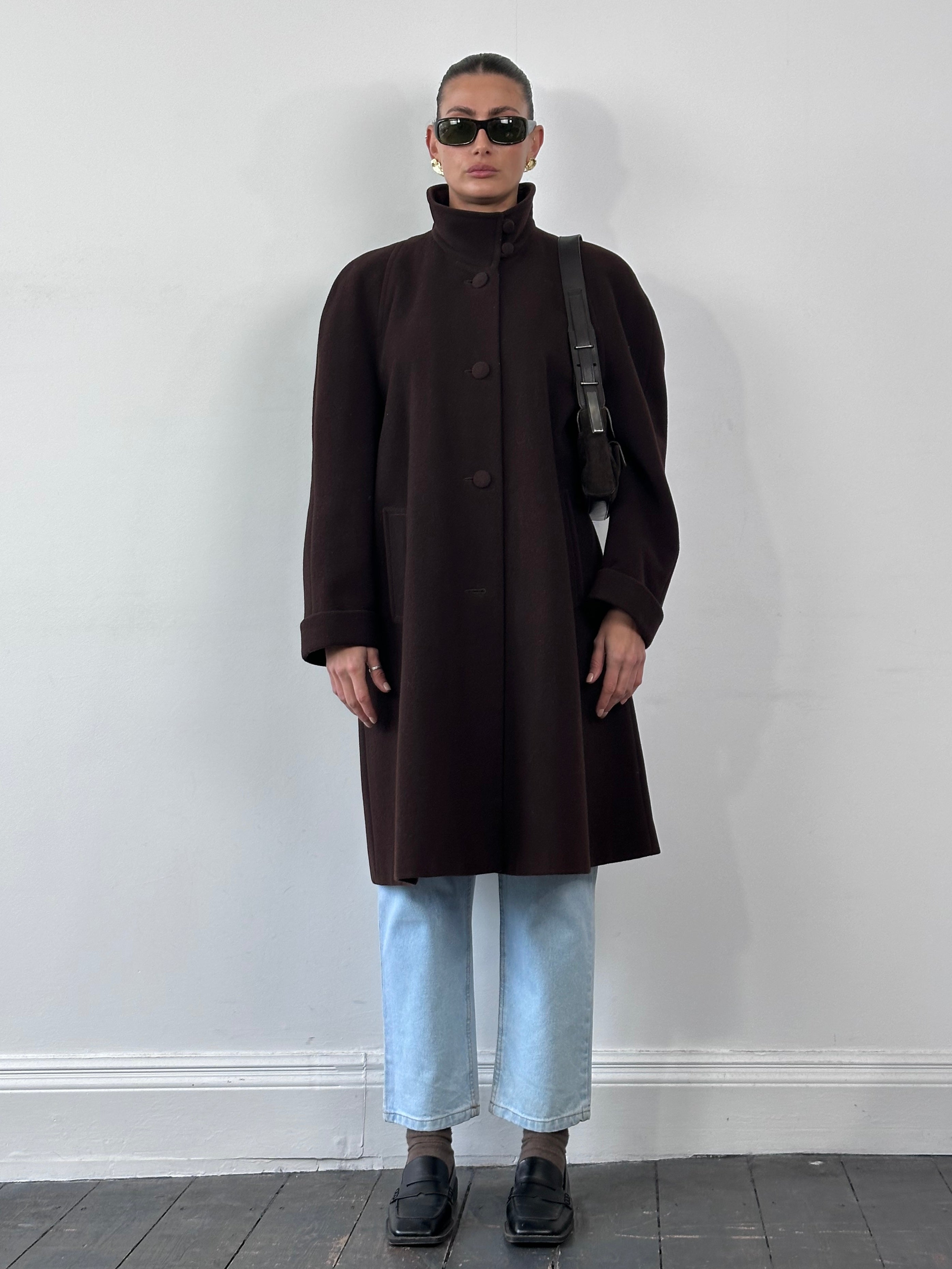 Vintage wool A-line funnel neck coat in XL, showcasing classic style with a structured silhouette and cozy fabric.