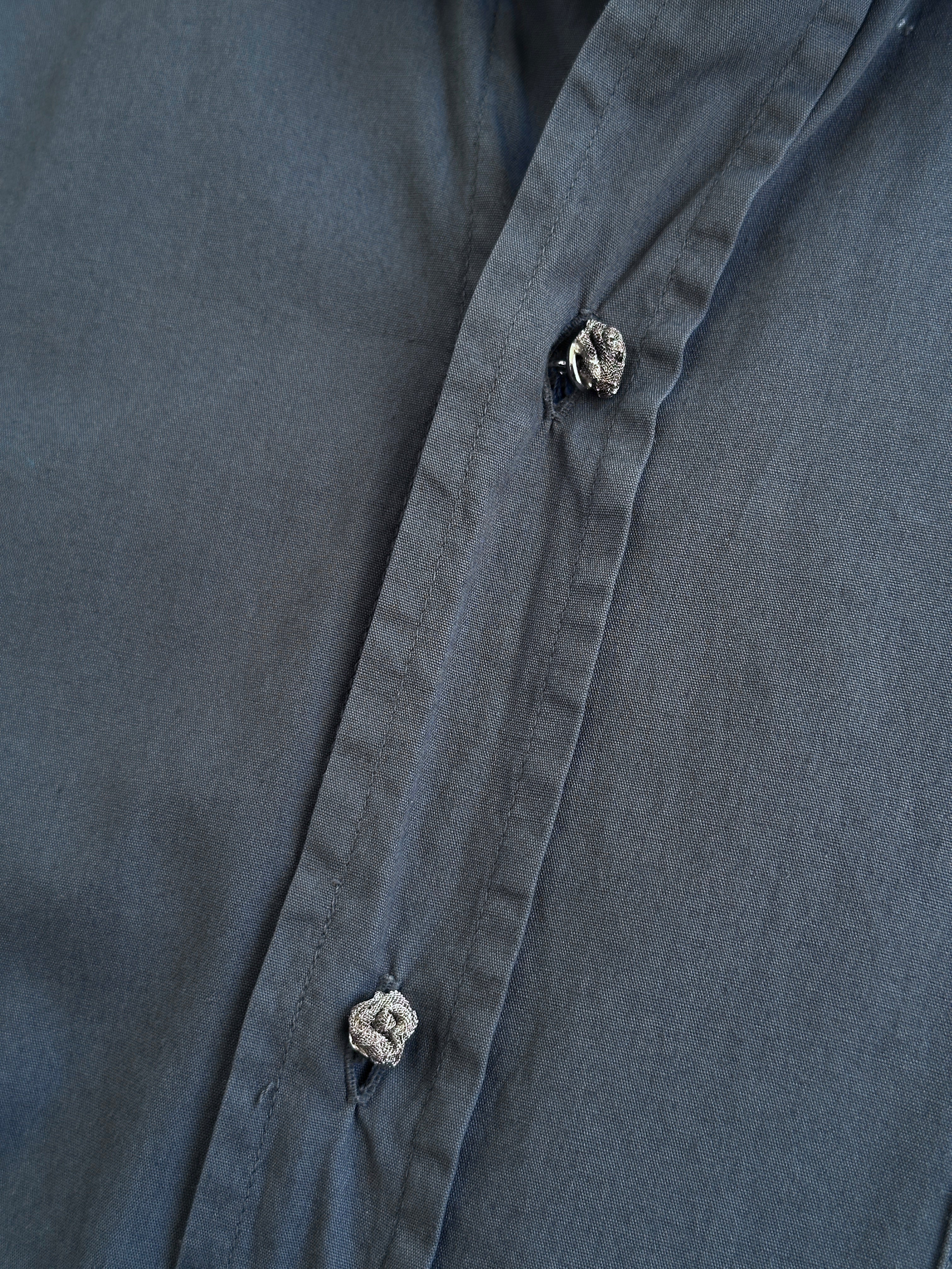 Moschino pure cotton bespoke button logo shirt in size L, featuring a classic design with the brand's signature logo detail.