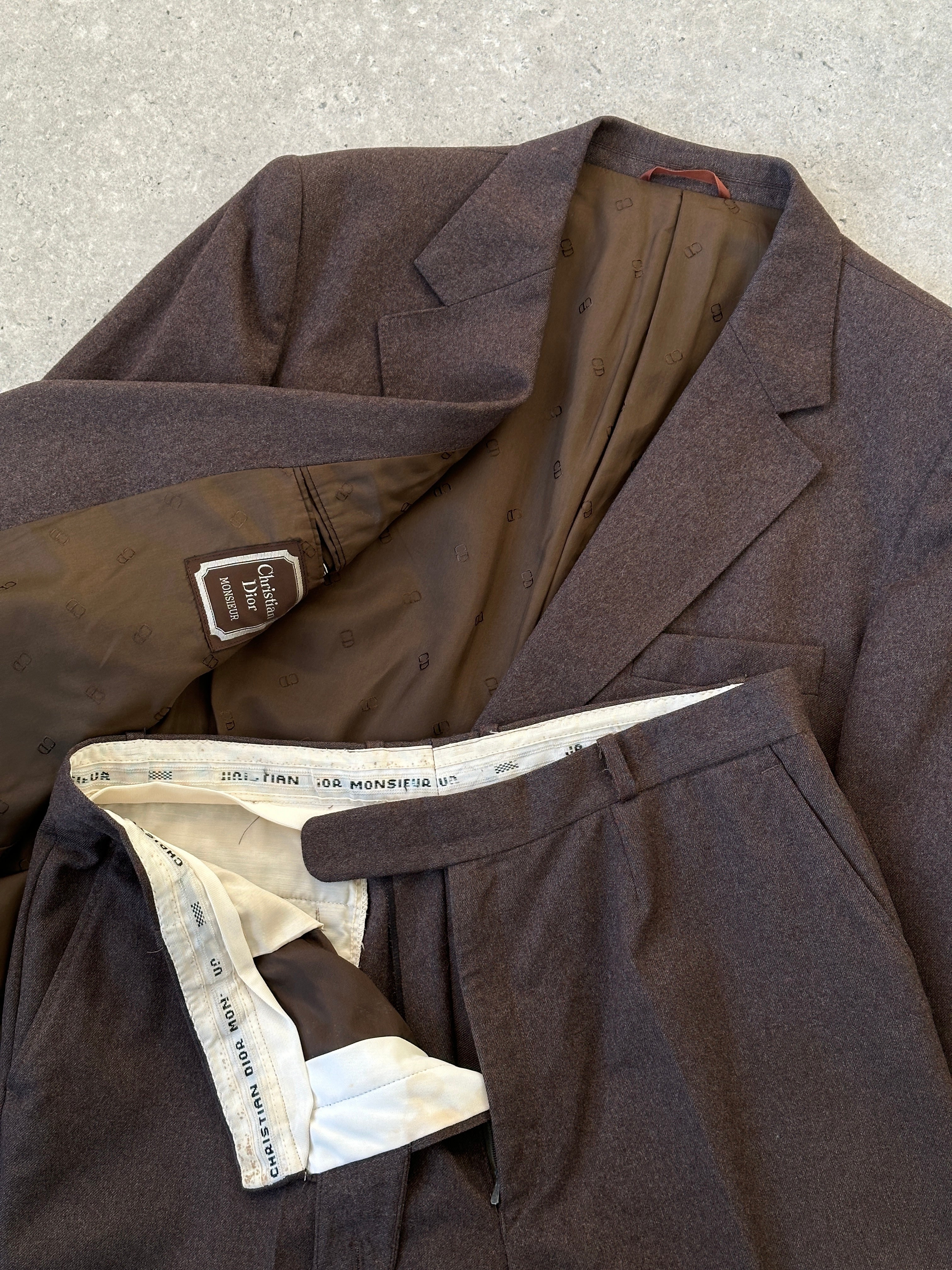 Christian Dior pure wool jumpsuit in size 46R/W34, tailored fit with elegant design, shown on a mannequin.