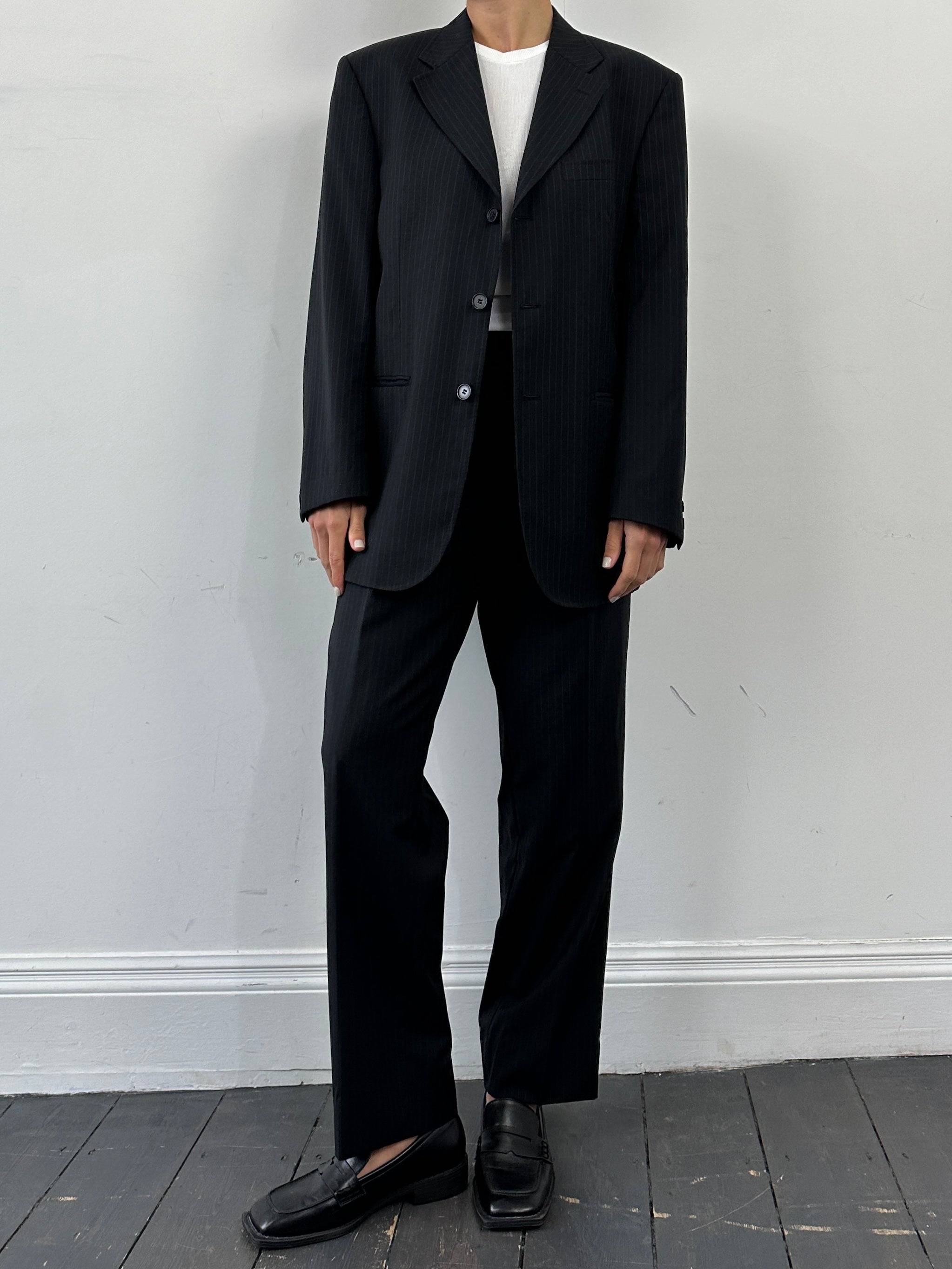 Gianfranco Ferre pinstripe pure wool single-breasted suit jumpsuit in size 42R/W36, featuring a tailored fit and classic pinstripe pattern.