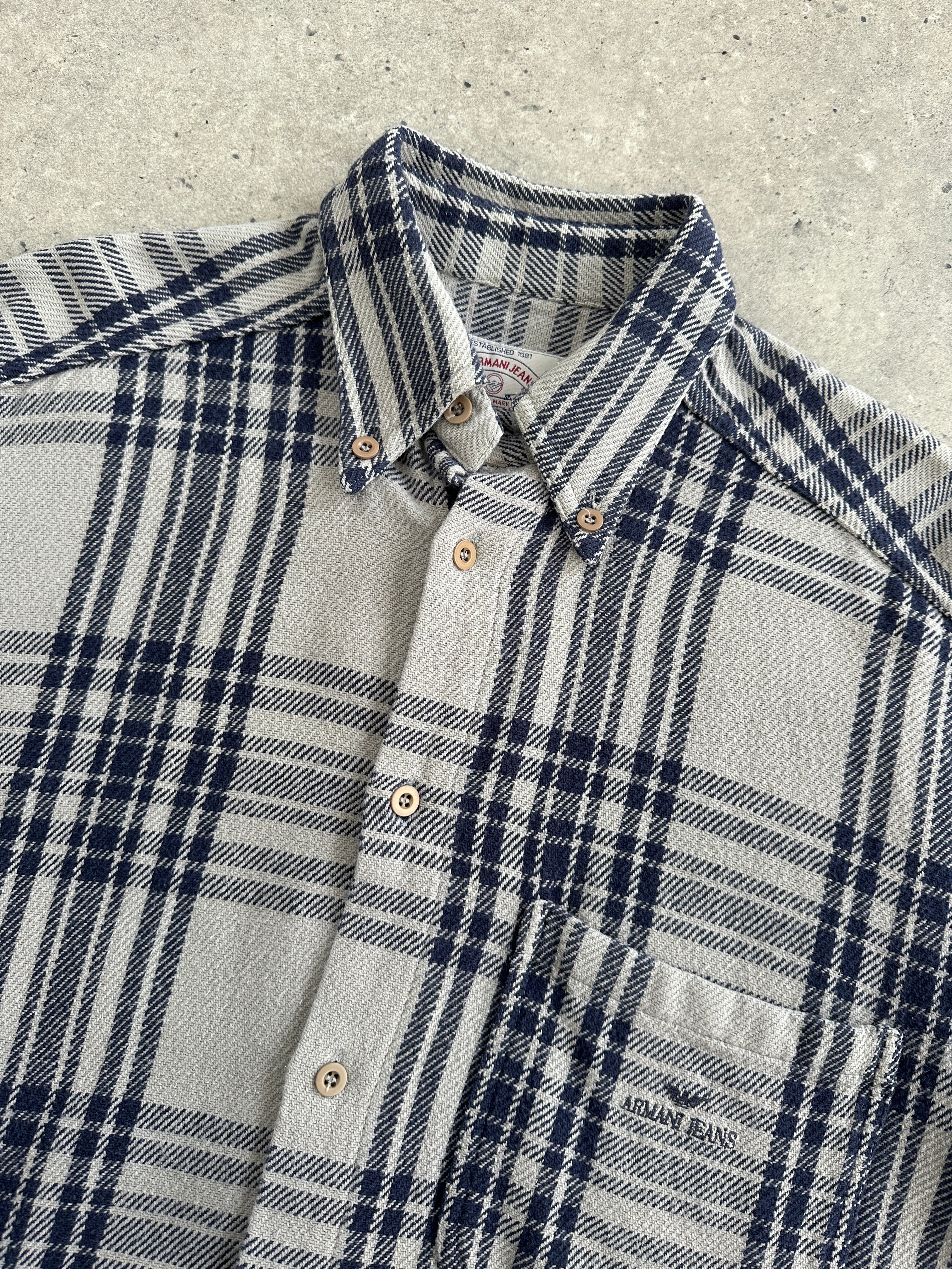 Armani Jeans check flannel cotton shirt in size L/XL with logo detail, featuring a classic plaid pattern and button front.