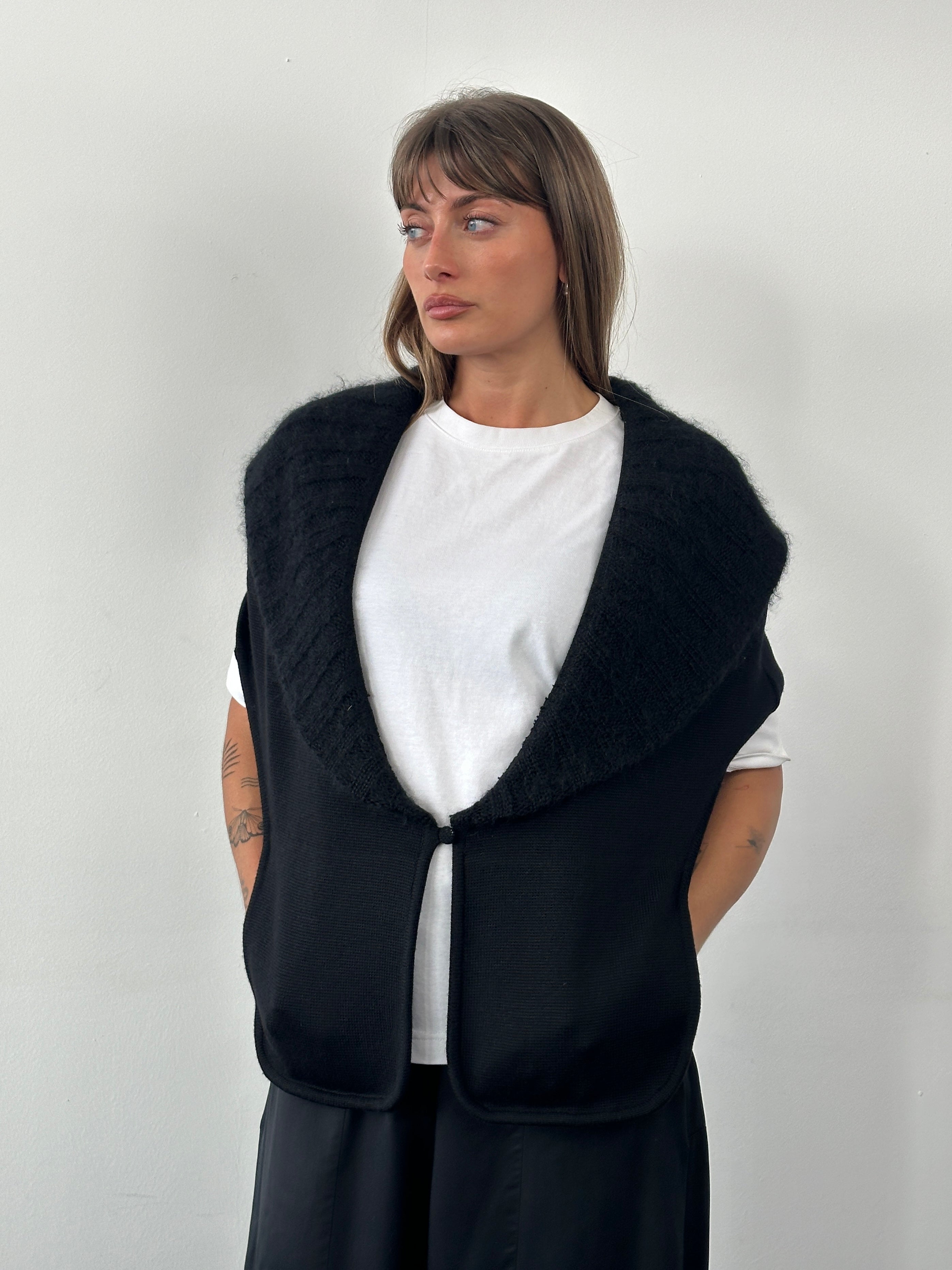 Italian vintage 1990s Armani merino wool knitted shawl scarf with intricate patterns and soft texture.