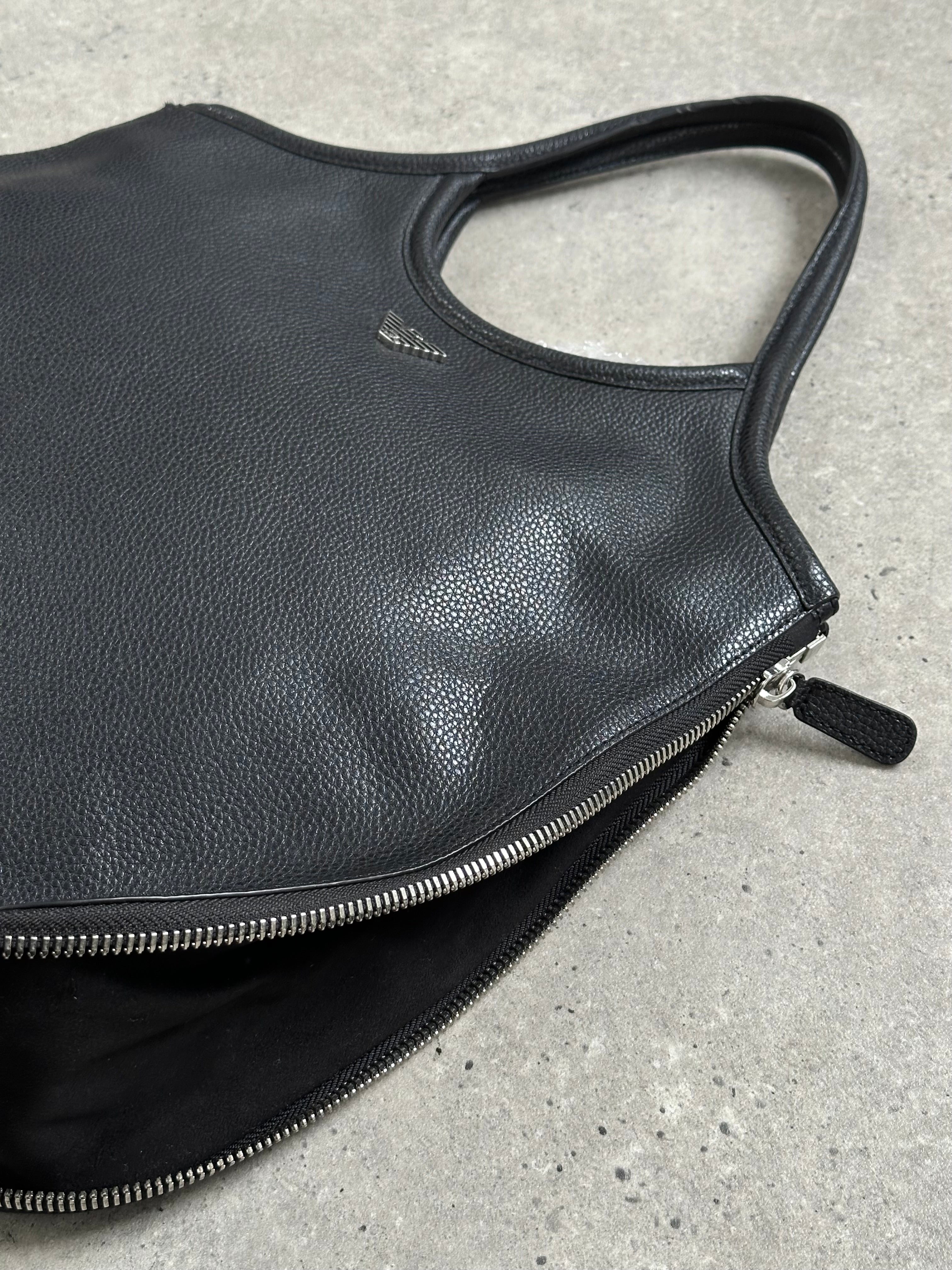 Emporio Armani 1990s leather shoulder bag with sleek design, featuring a structured silhouette and classic branding details.