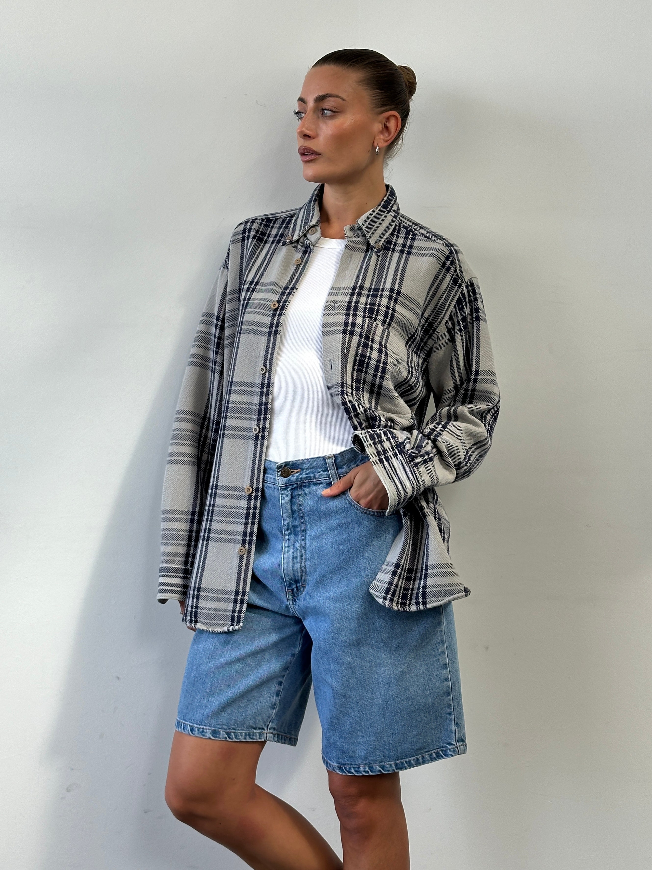 Armani Jeans check flannel cotton shirt in size L/XL, featuring a classic plaid pattern and Armani logo detail.