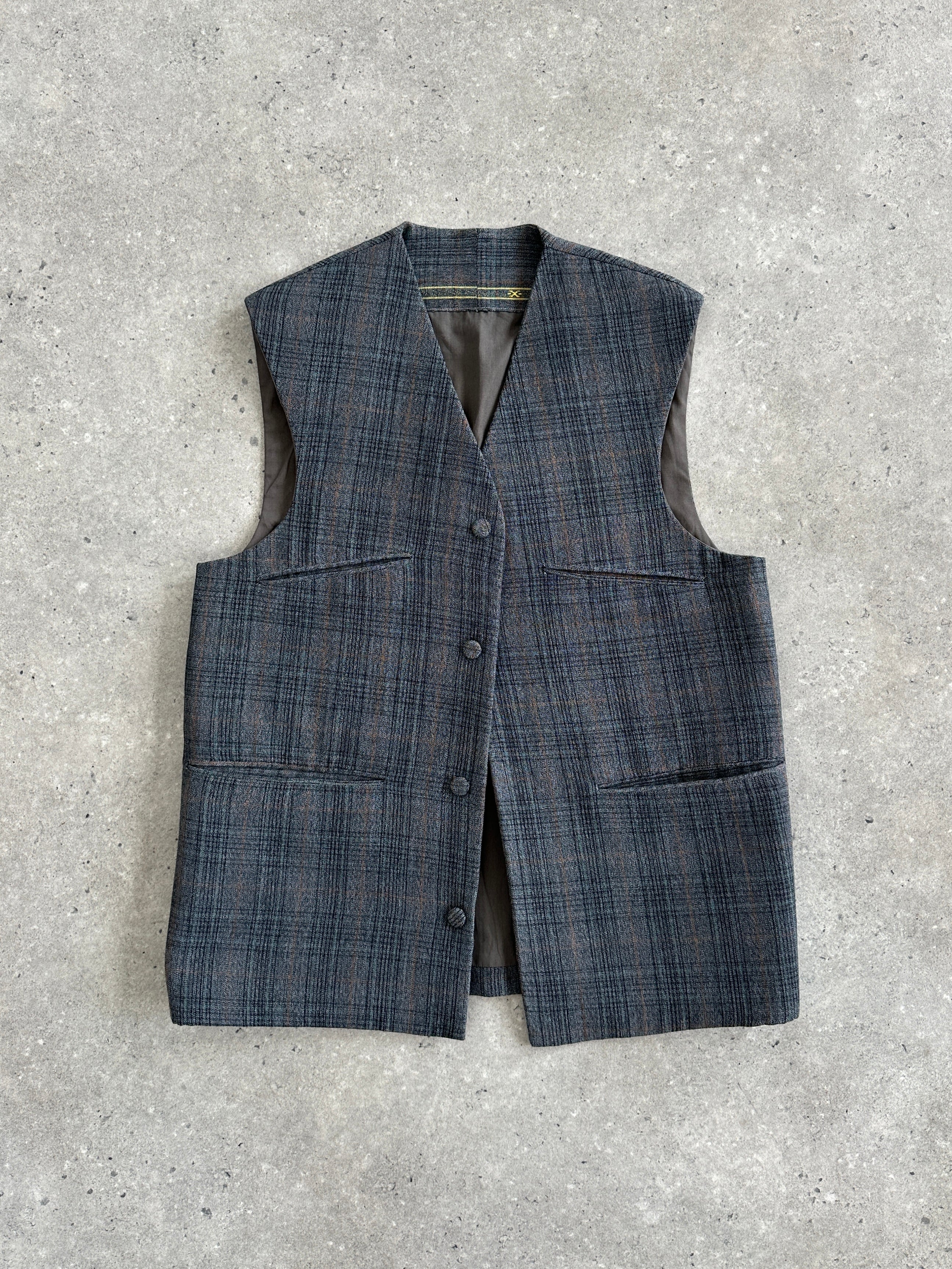 Vintage handmade check waistcoat in size M, featuring classic pattern and tailored fit, perfect for vintage-inspired style.