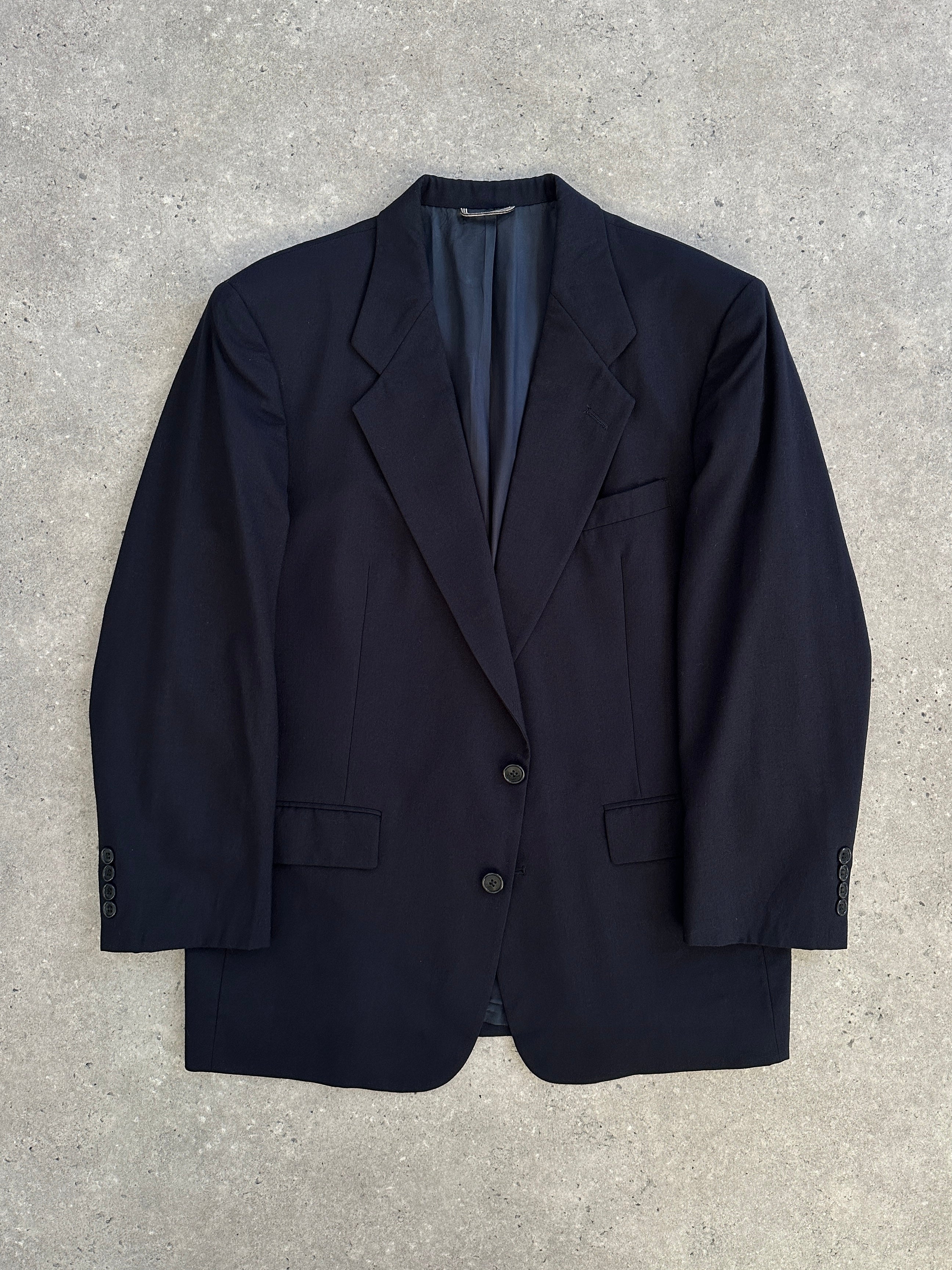 Christian Dior Monsieur 1980s pure wool single-breasted blazer in size 42S/L, shown on a hanger with a classic tailored fit.