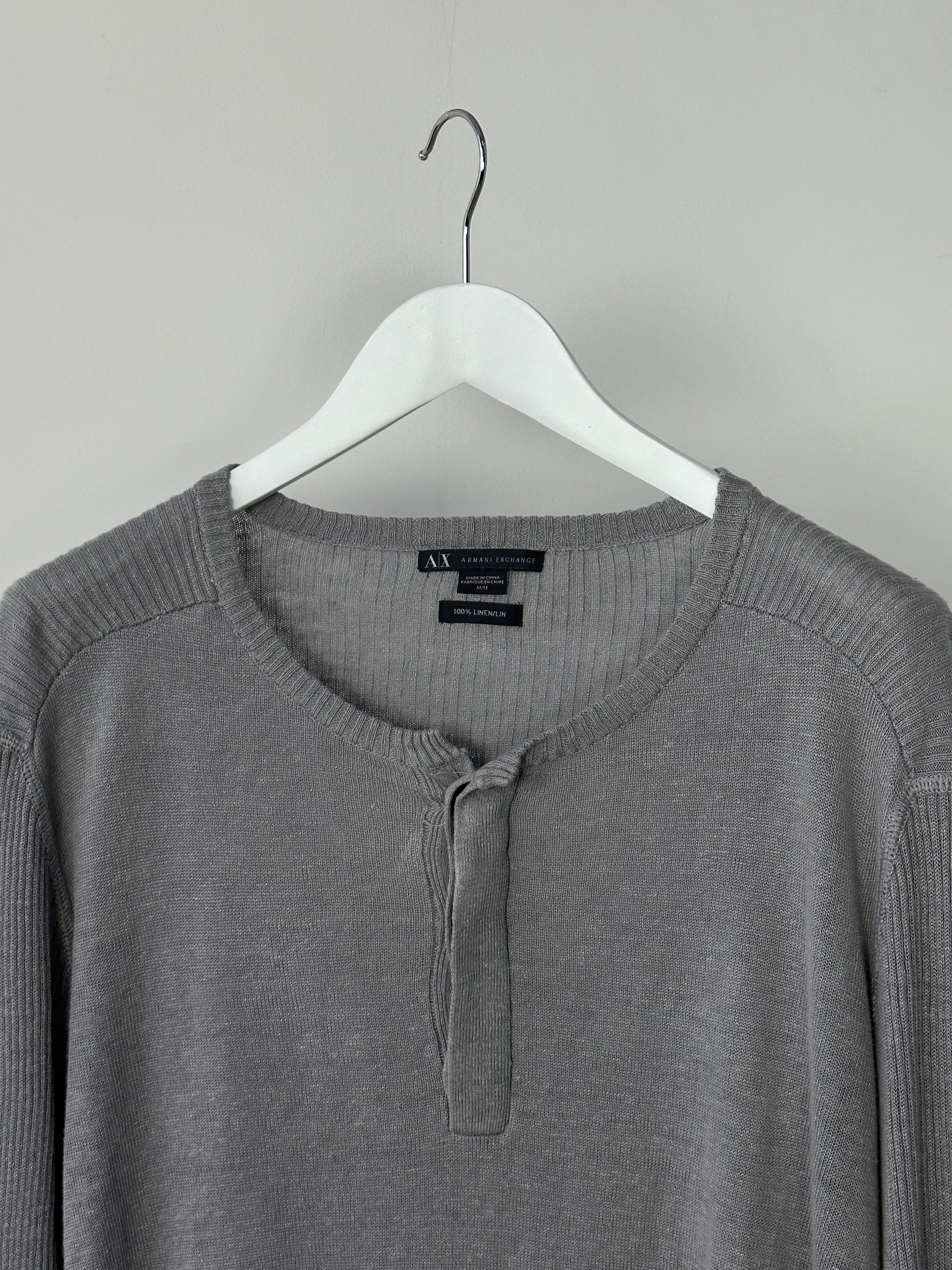 Armani Exchange pure linen slim fit long sleeve T-shirt in size L, featuring a classic design and lightweight fabric.