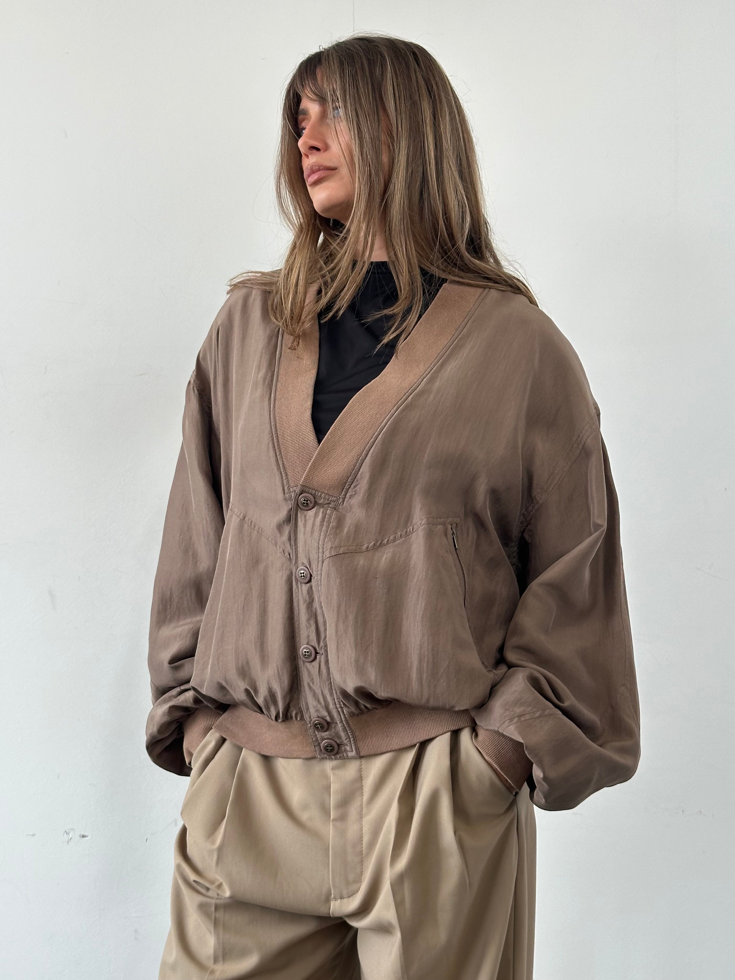 Vintage Pure Silk Bomber Jacket in XL, showcasing smooth silk fabric, classic bomber style, and a sleek design.