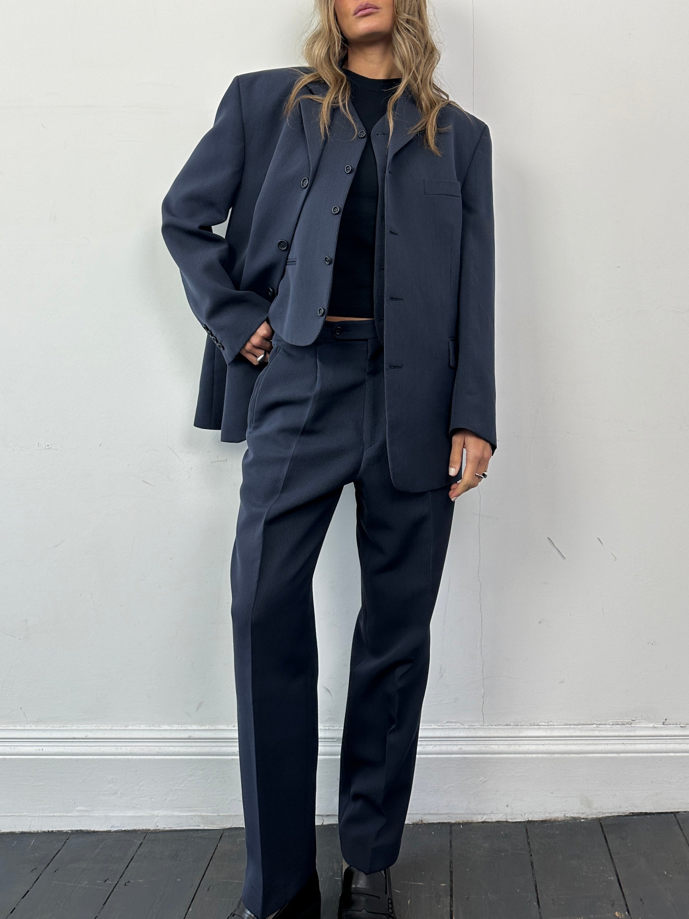 Vintage wool blend three-piece suit, size 40R/W32, featuring a jacket, vest, and trousers in classic style.