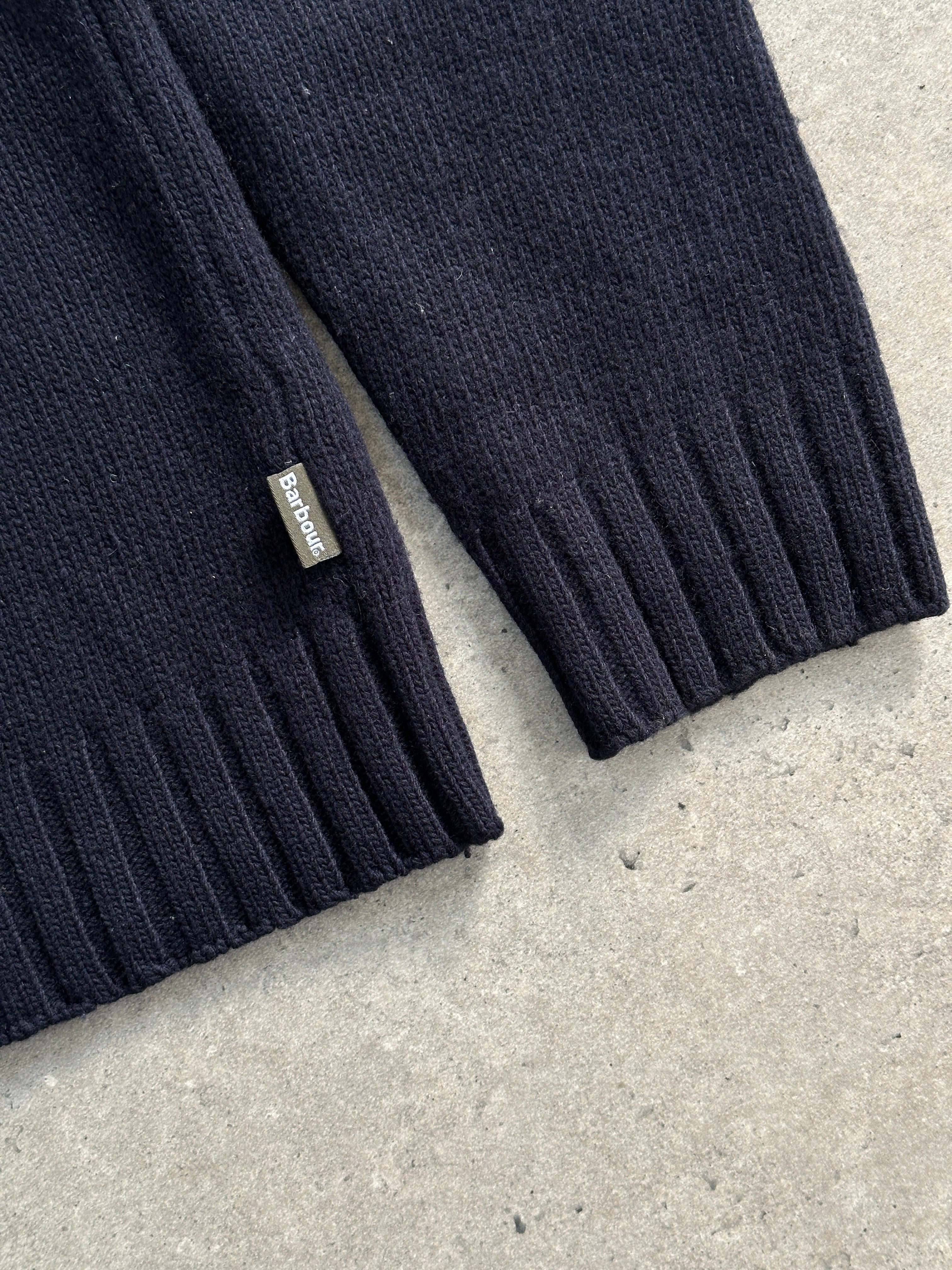 Barbour Pure Wool Roll Neck Jumper in size M, featuring a classic knit design and a cozy roll neck collar.