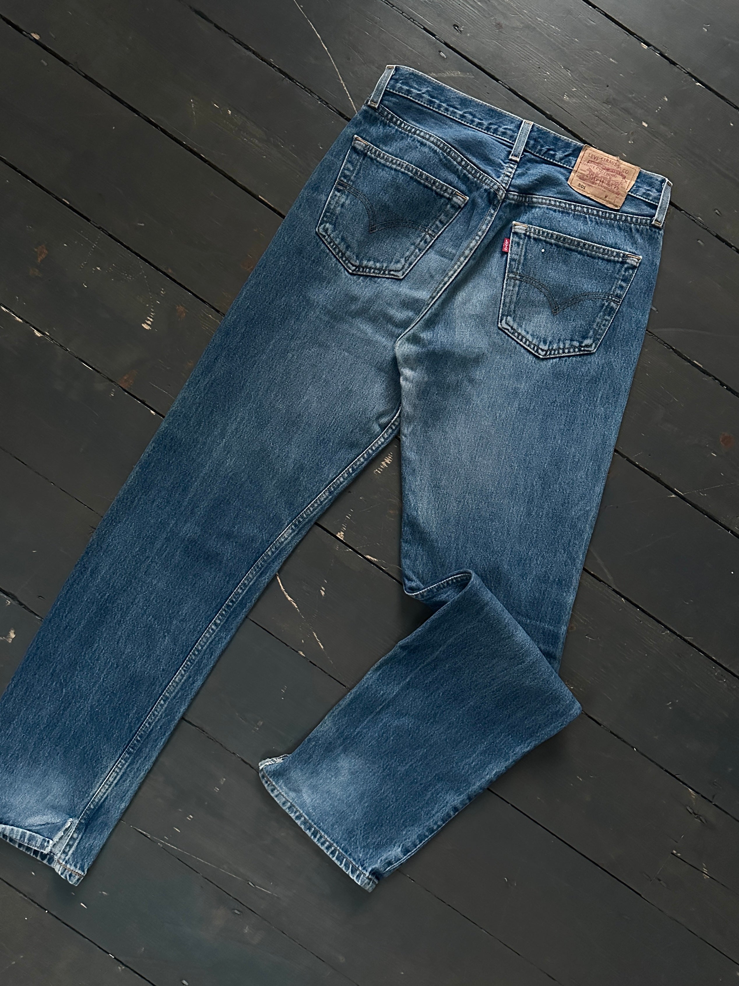Levi's 501 Mid Wash Distressed Straight Leg Denim Jeans, W30, showing front view with distressed details and classic fit.