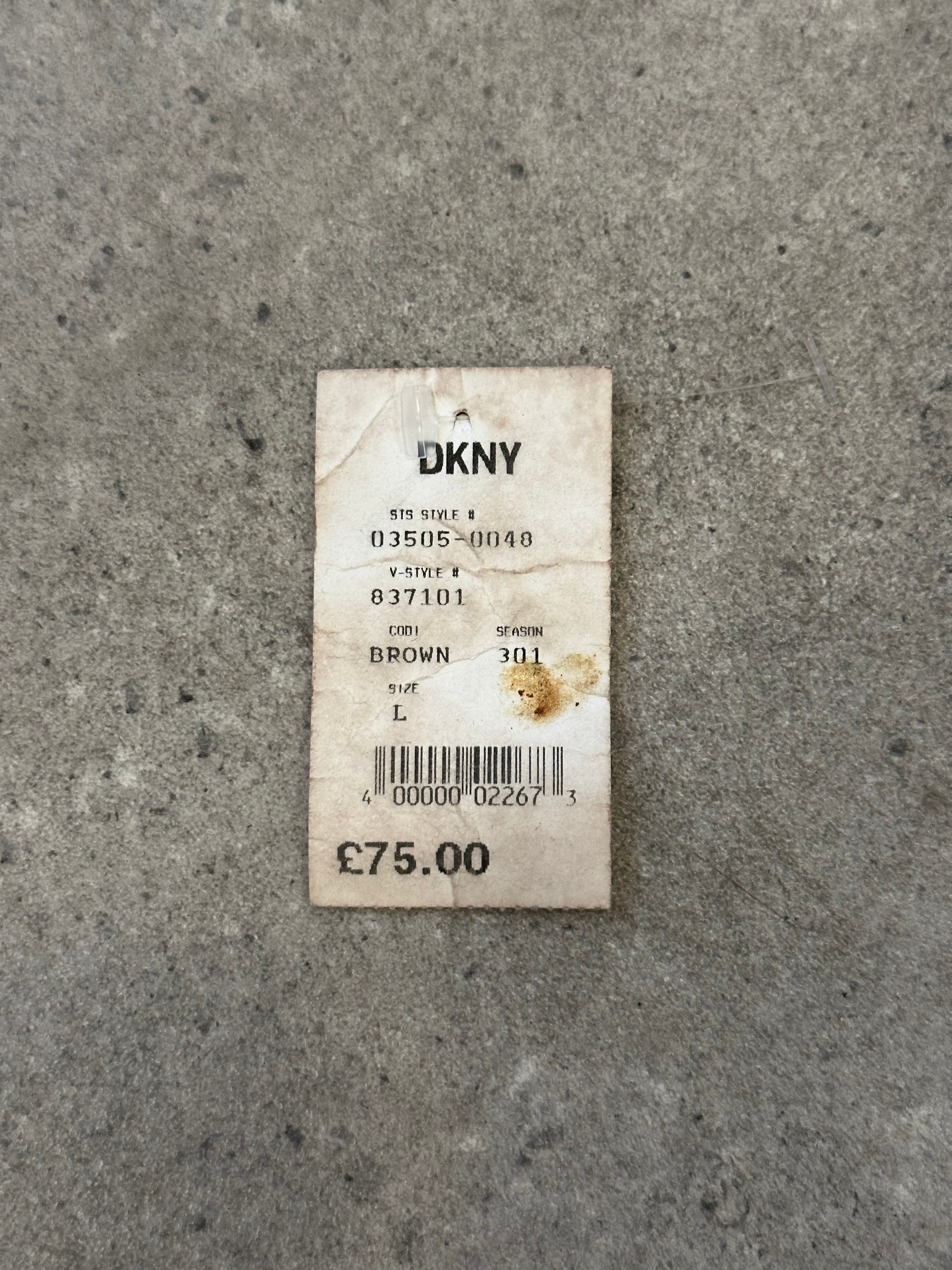 DKNY leather chunky utility belt bag with adjustable W31-33 waist, featuring a stylish design and multiple compartments.