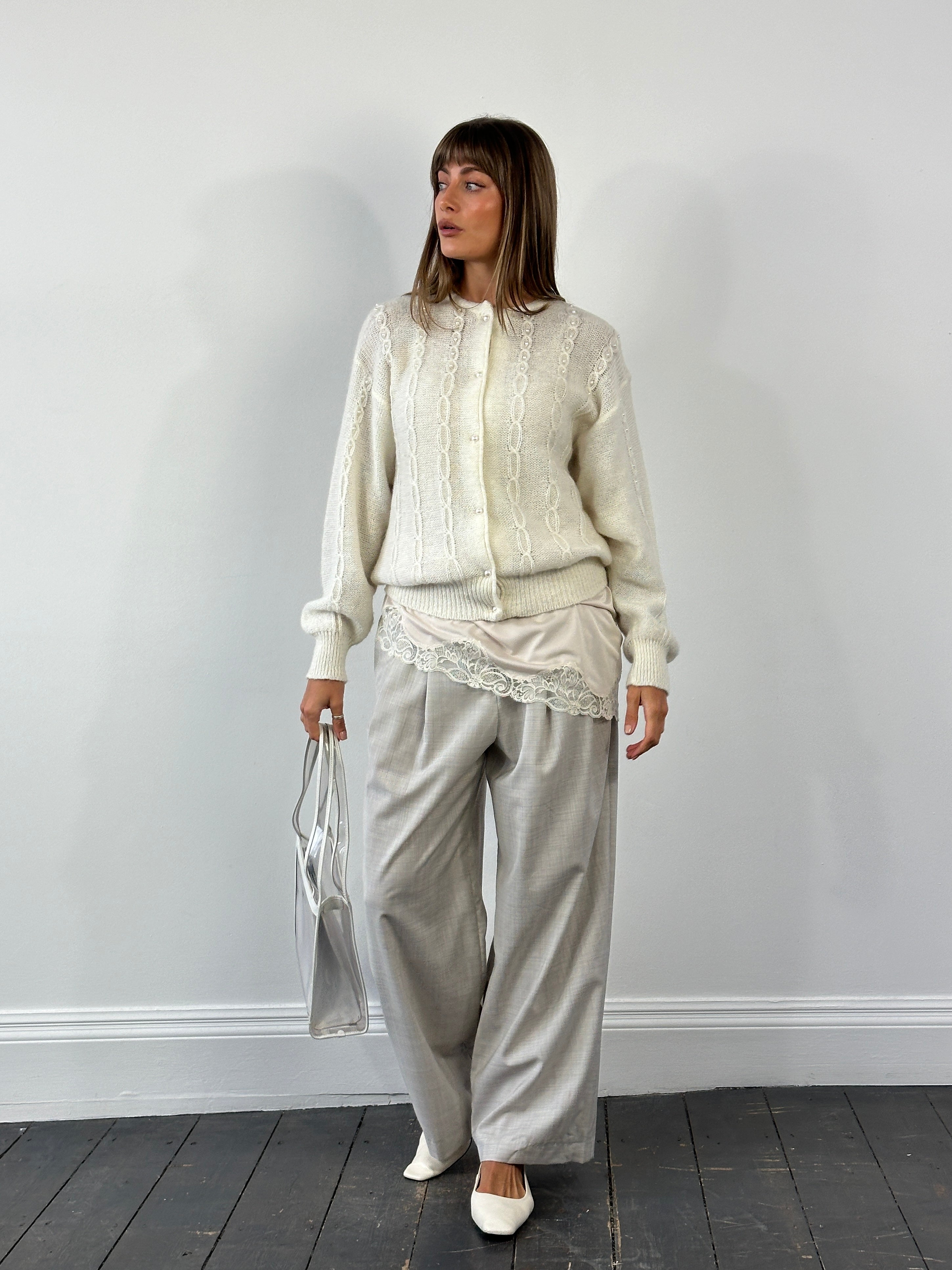 Italian vintage 1980s mohair knitted cardigan in size M, featuring a soft, textured knit pattern and classic design.