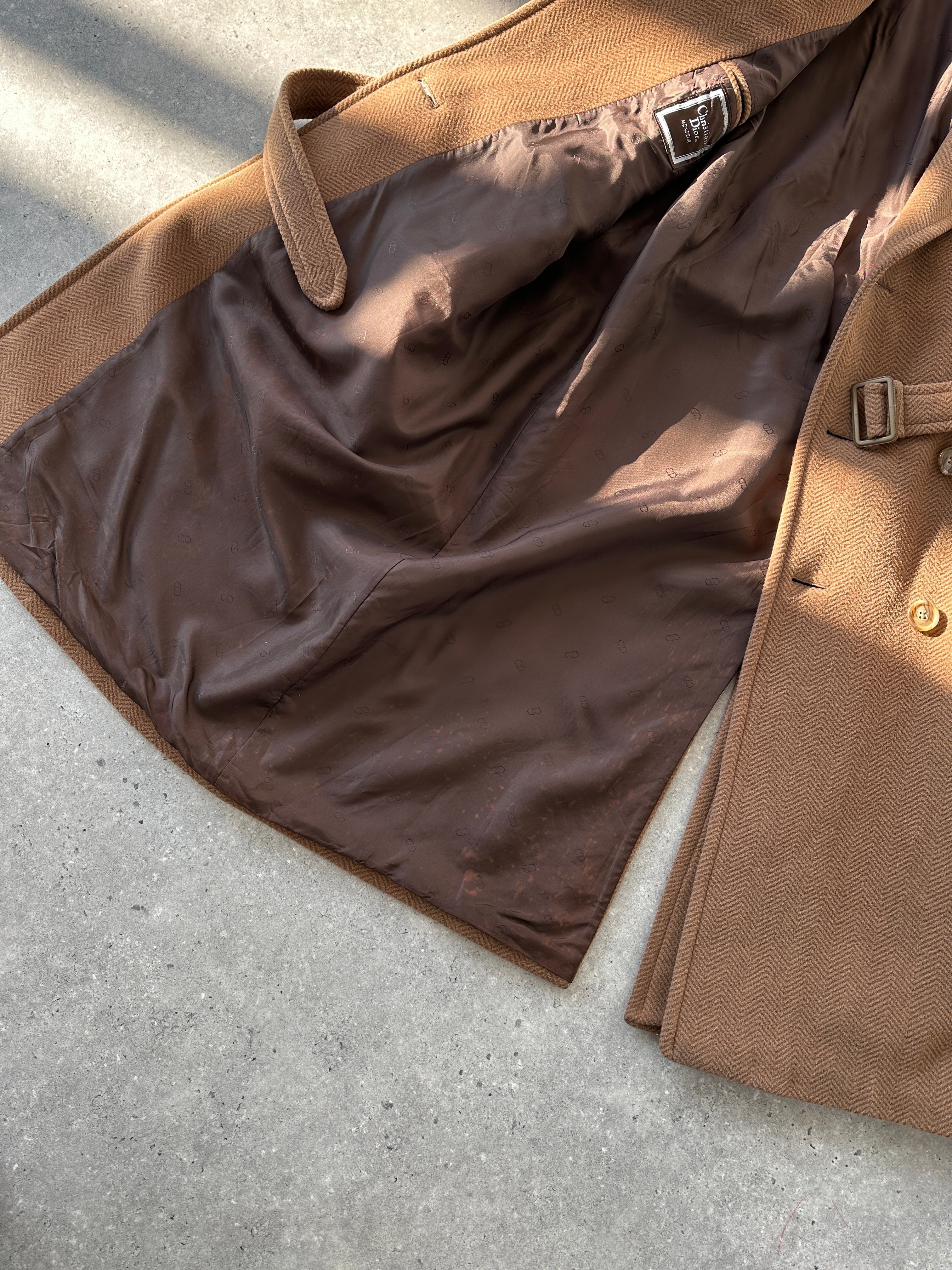 Christian Dior belted double-breasted wool coat in size L, featuring classic design and tailored fit.