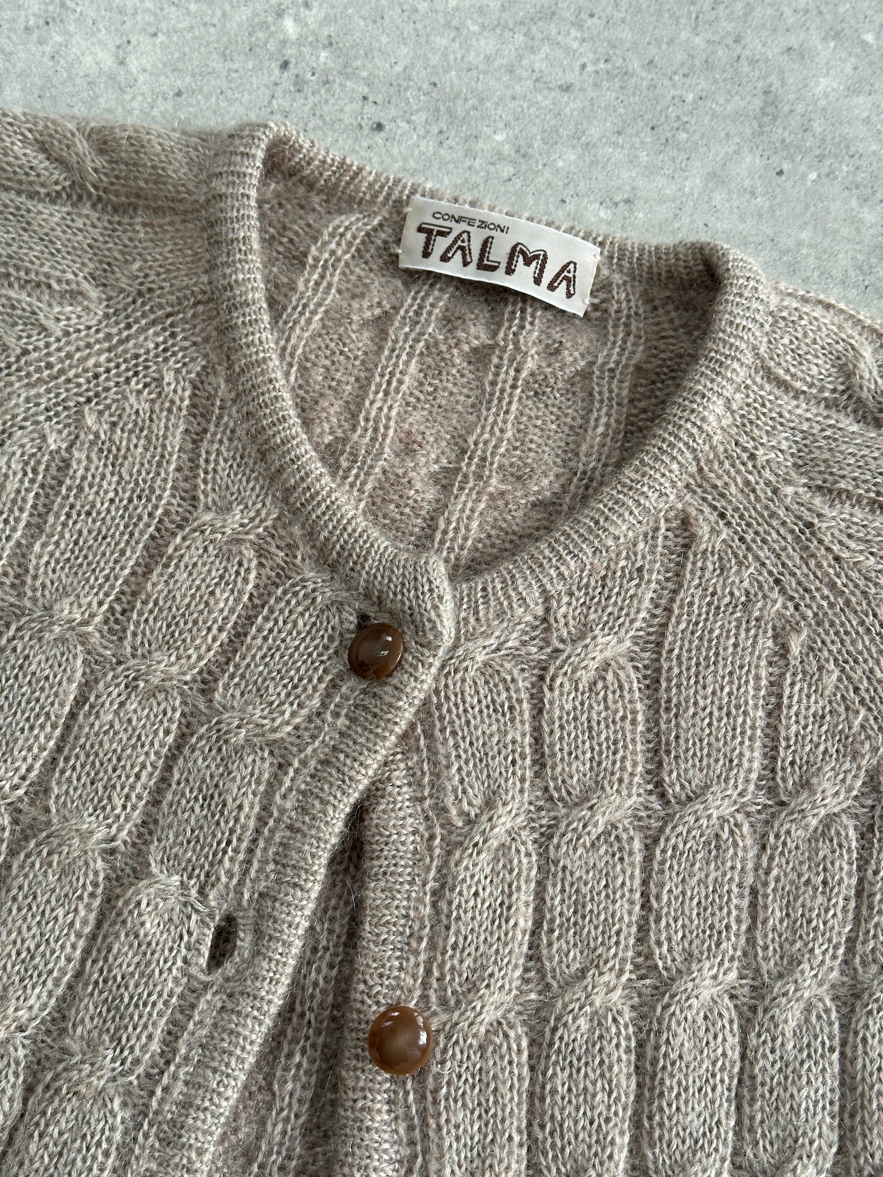 Vintage Italian mohair knitted cardigan in size M, featuring a cozy, textured knit pattern and classic design.