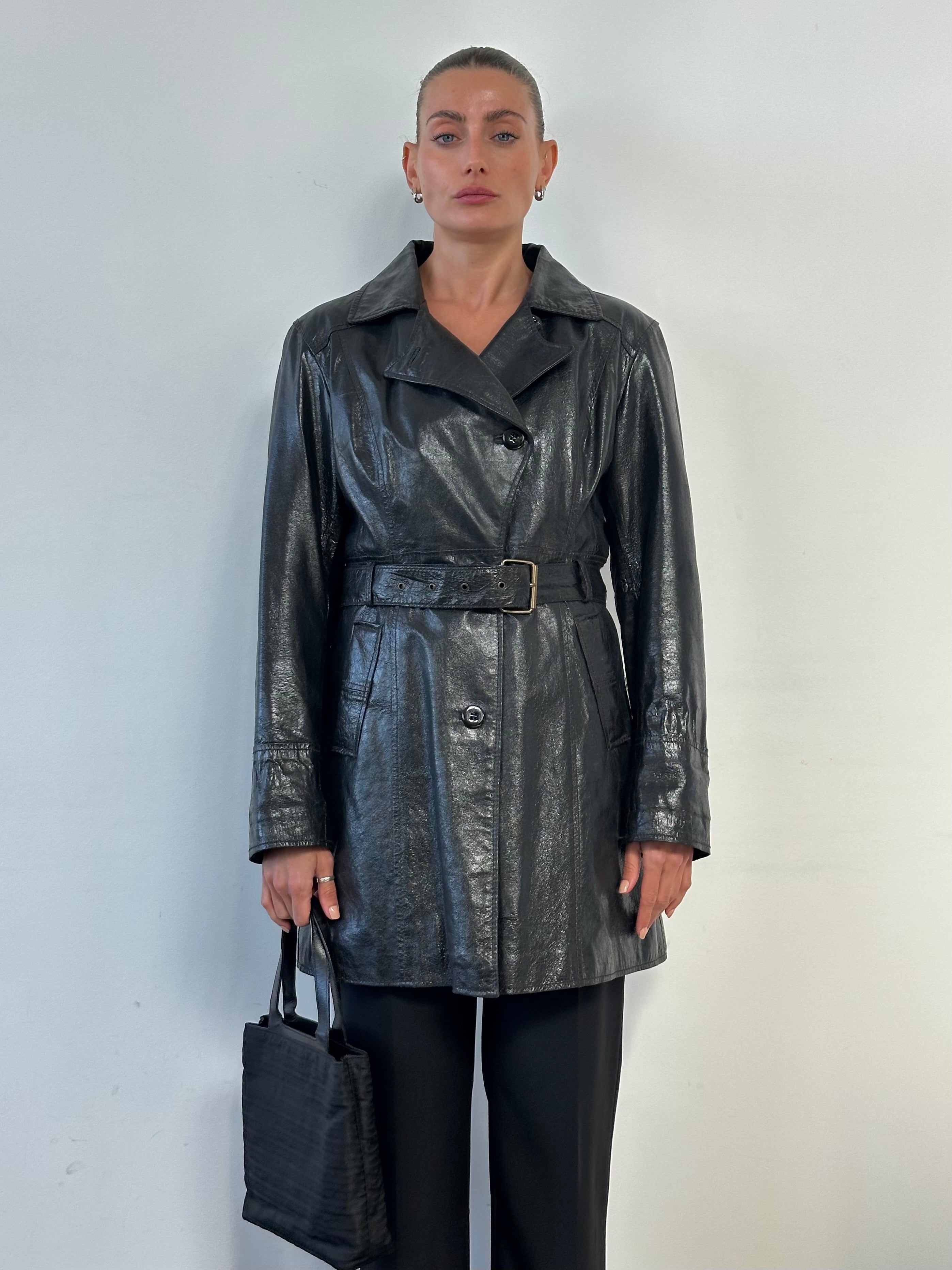 Conbipel leather belted trench coat jacket in size M, featuring a classic design with a stylish belt and leather accents.