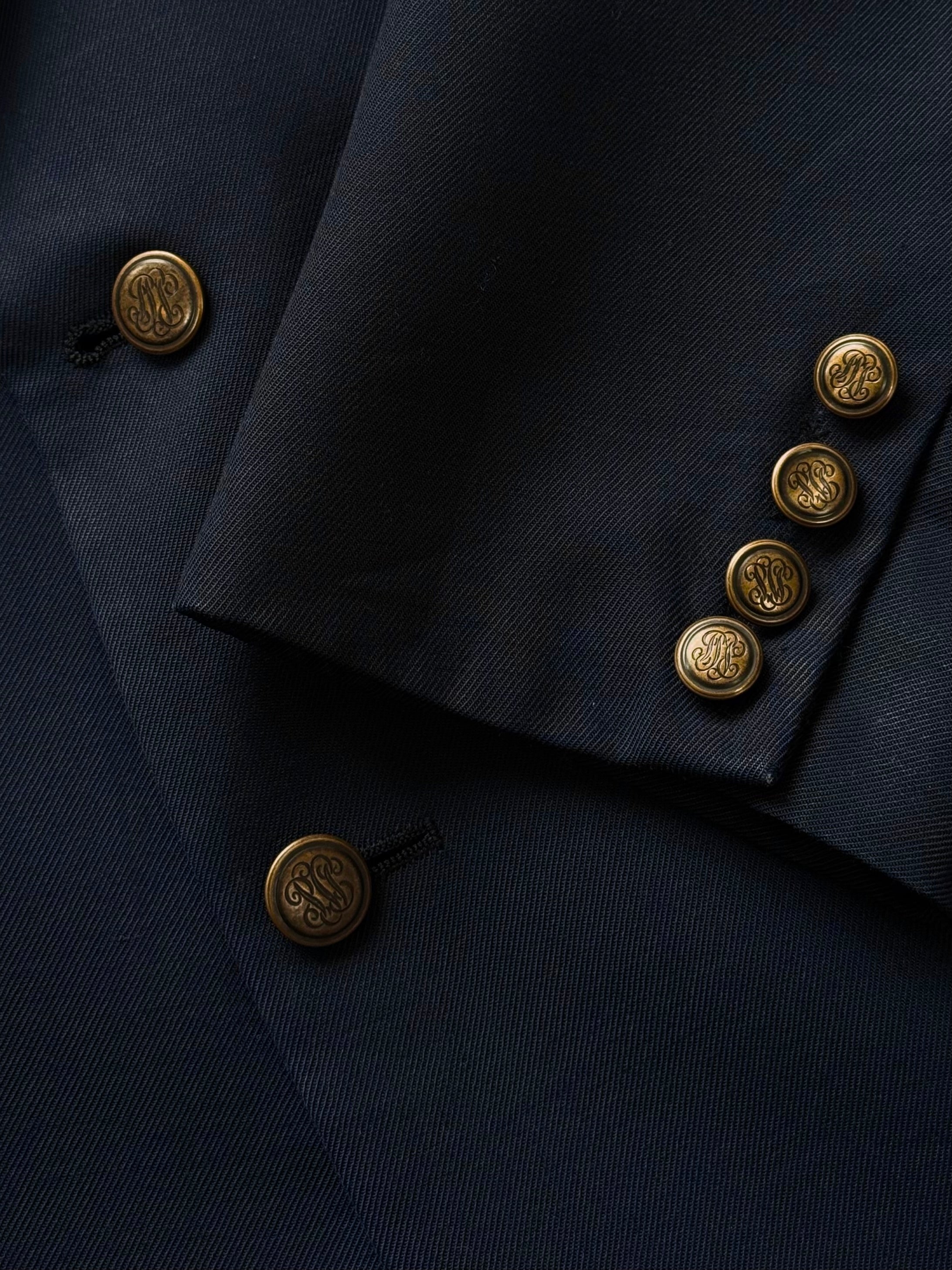 Christian Dior Monsieur 1990s pure wool single-breasted blazer in size 44R/XL, shown on a hanger with a tailored fit.