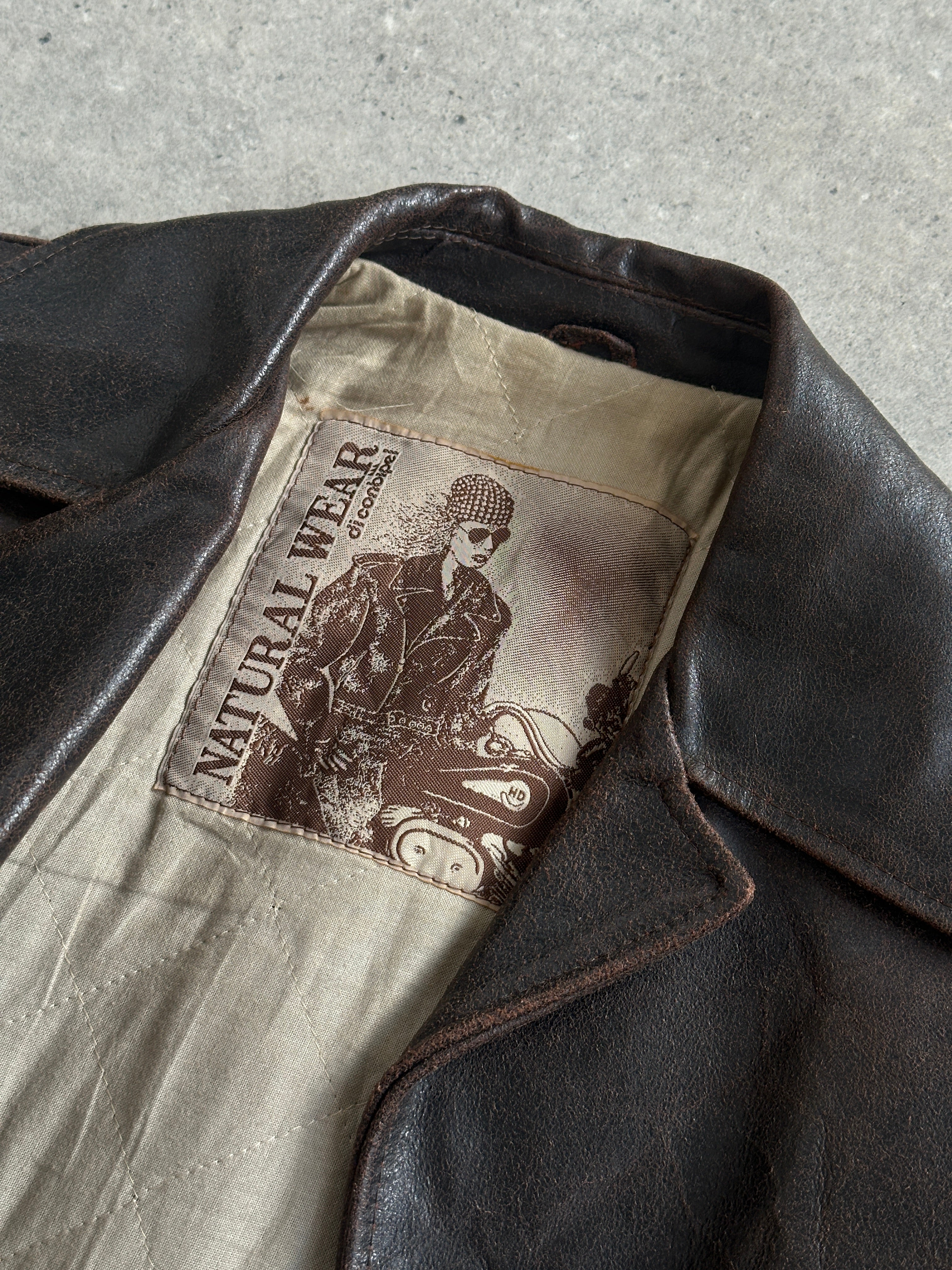 Conbipel 1970s Italian aged leather jacket in M/L size, featuring vintage style and distressed brown leather.