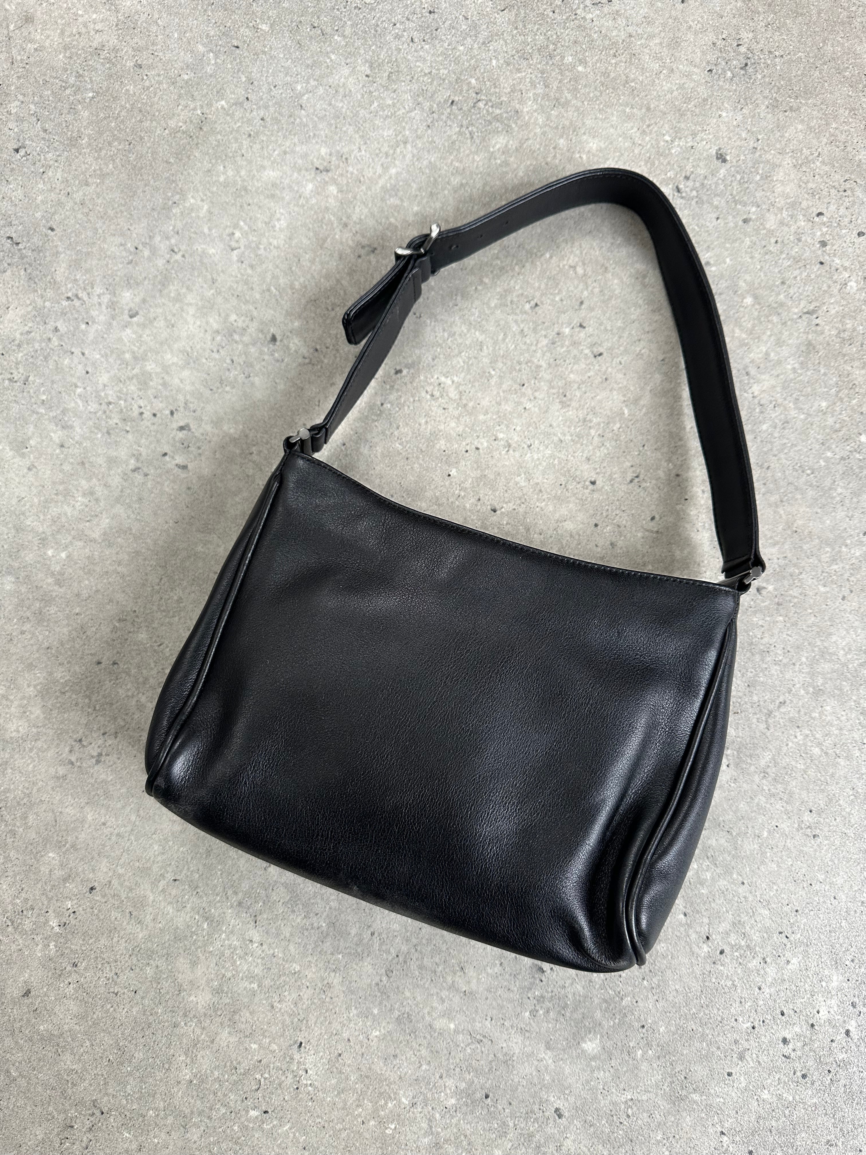 Giorgio Armani 2000s leather shoulder bag with sleek design and adjustable strap, featuring subtle brand logo details.