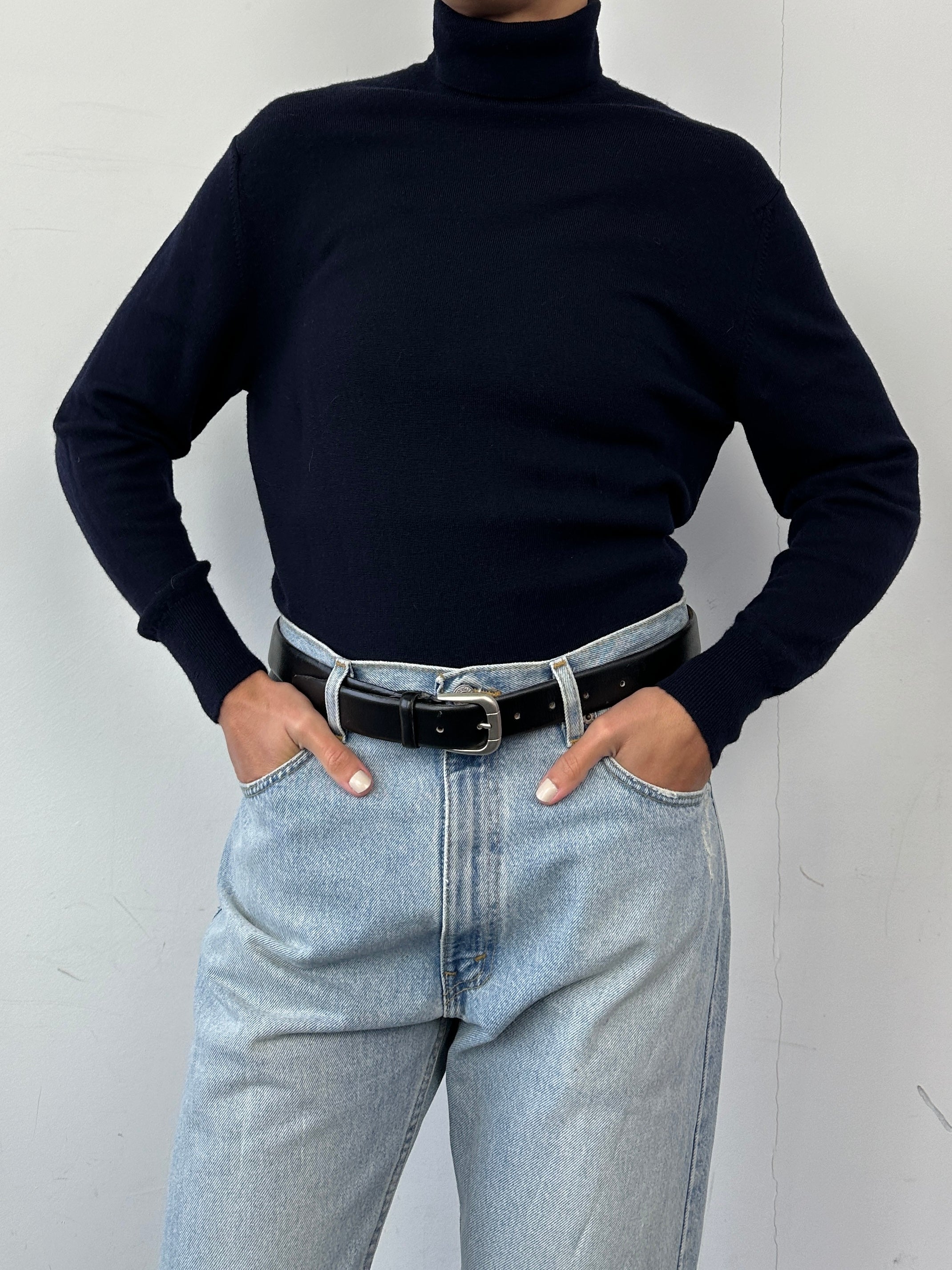 Jaeger pure wool knitted roll neck jumper in size M, featuring a cozy, textured knit design and classic fit.