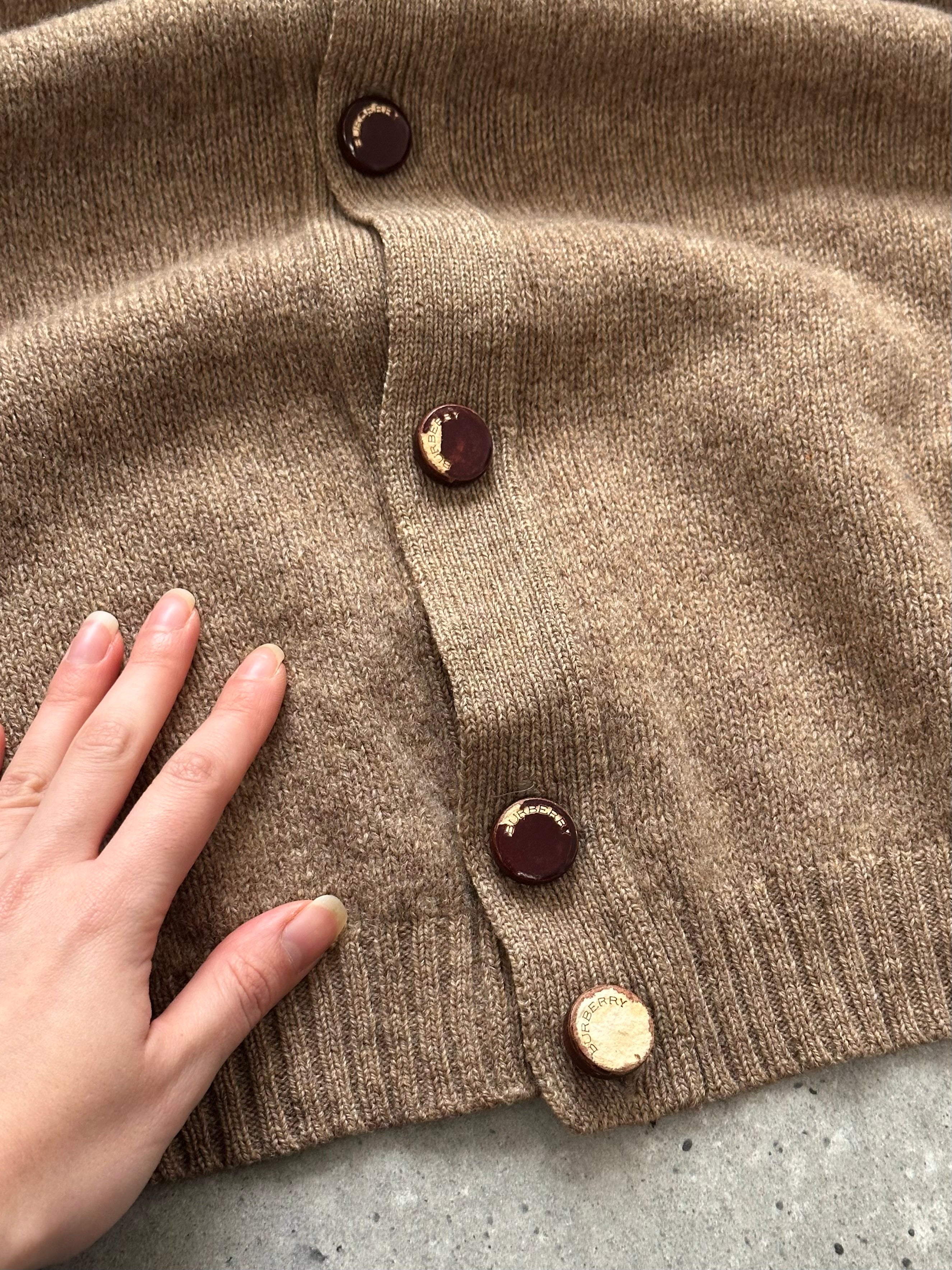 Burberry London 1990s wool knitted logo cardigan in XL, featuring a classic design and signature branding, displayed on a neutral background.