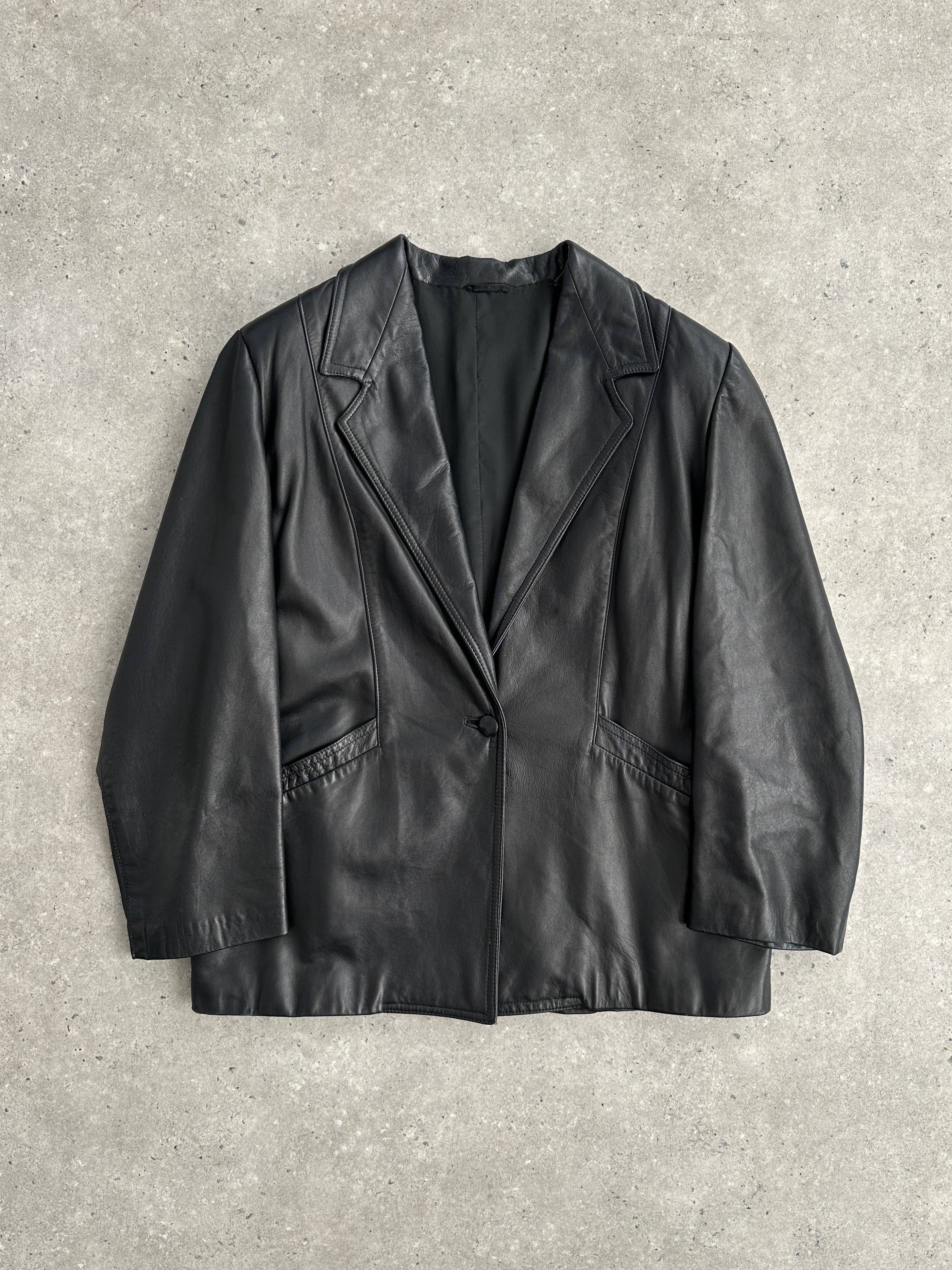 Vintage single button leather blazer jacket in classic brown leather, tailored fit, stylish for casual or formal wear.