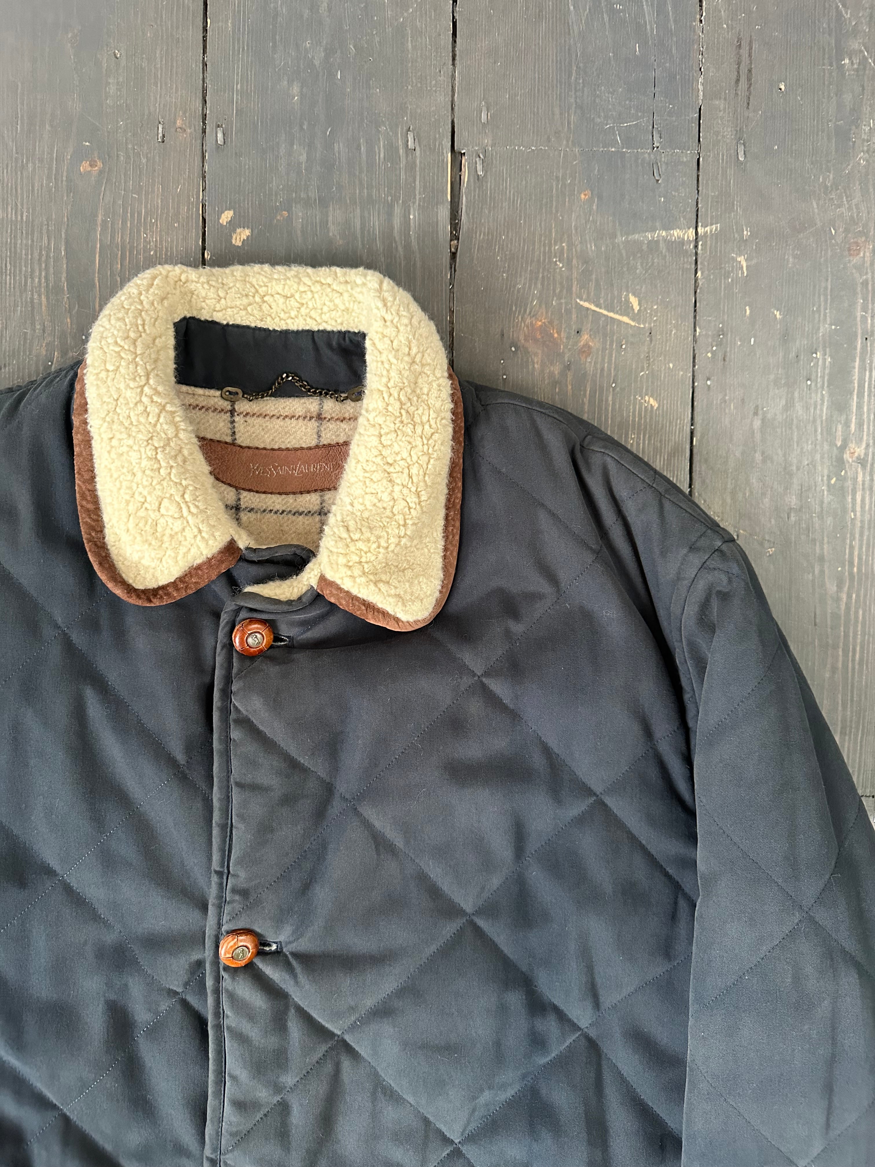 Yves Saint Laurent wool-lined jacket in size XL, featuring a tailored fit with a stylish collar and button closure.