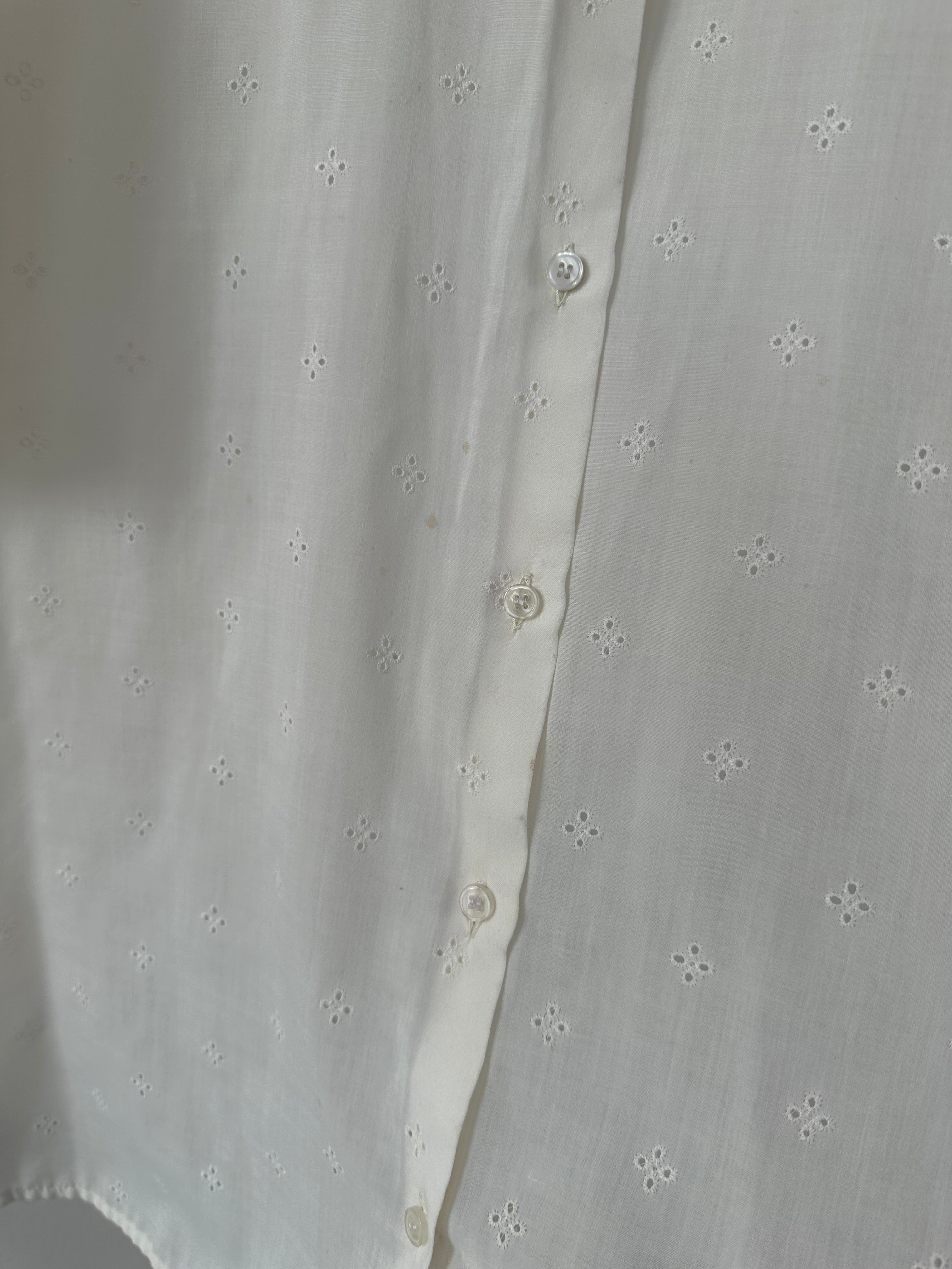 Vintage Pointelle Sheer Short Sleeve Shirt in size M/L, featuring delicate knit pattern and lightweight, breathable fabric.