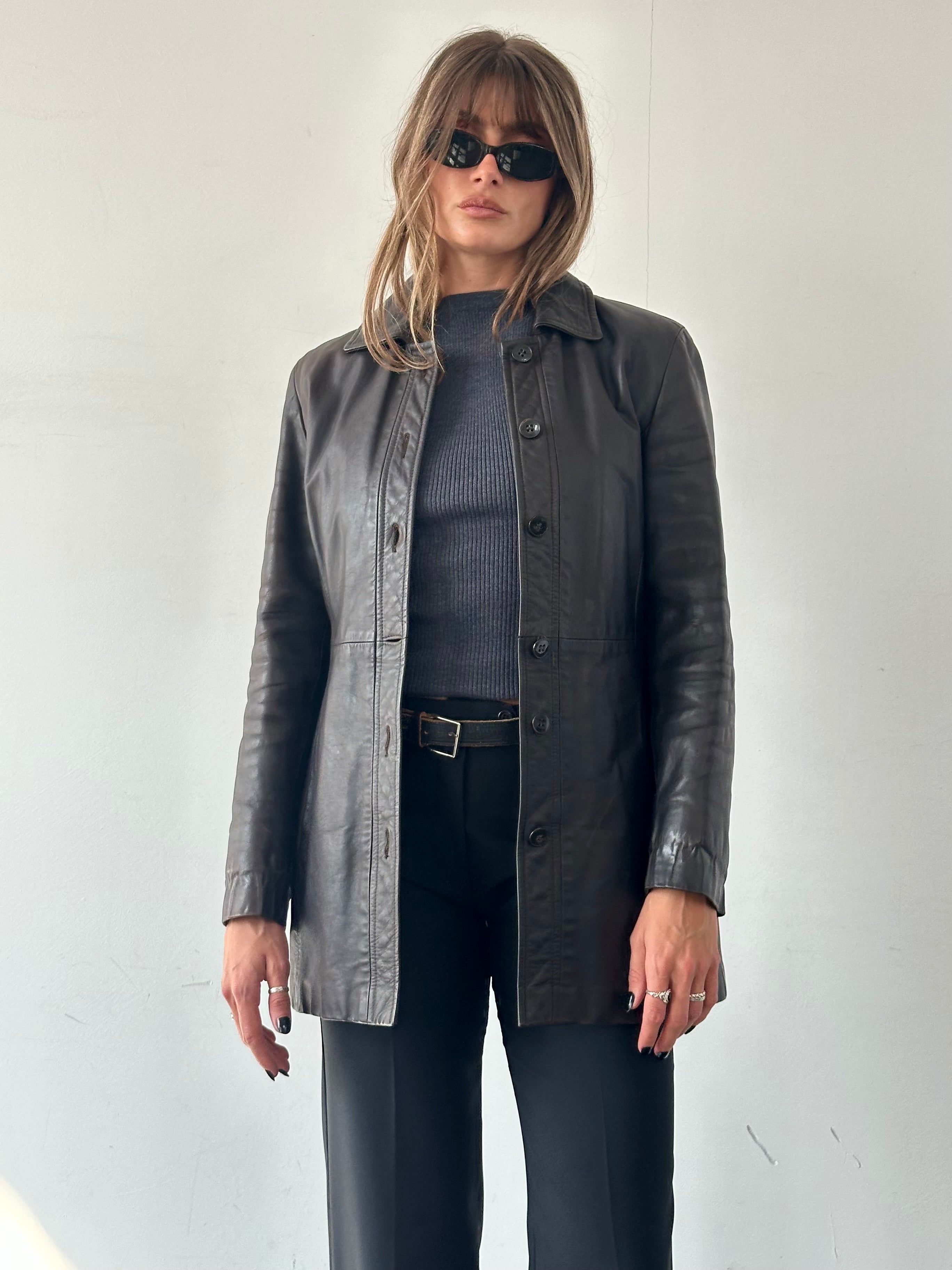 Emporio Armani leather jacket in size S, featuring classic design with smooth black leather and stylish details.