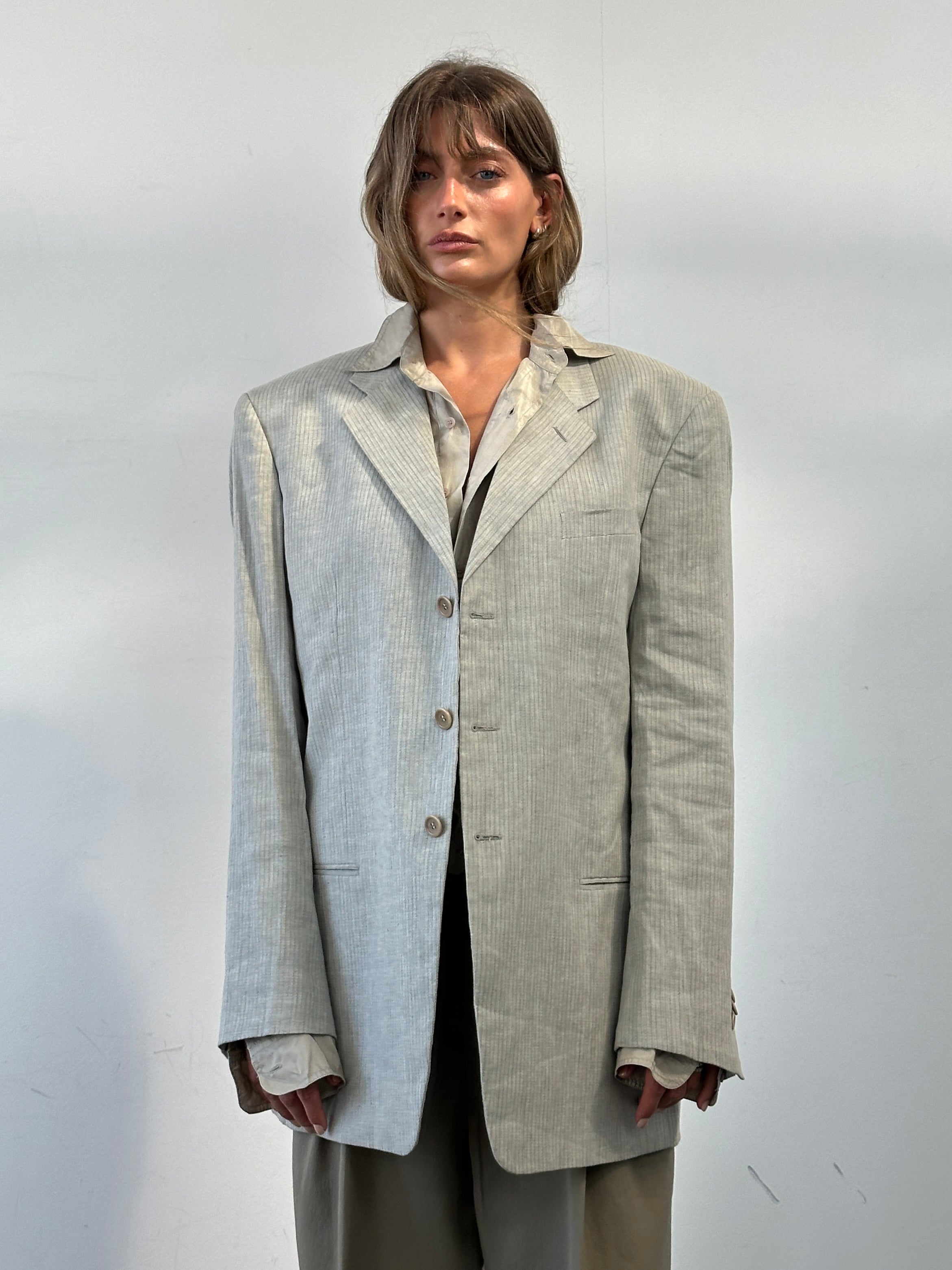 Armani Collezioni striped linen cotton relaxed blazer in size 42R/XL, featuring a tailored fit and classic stripe pattern.
