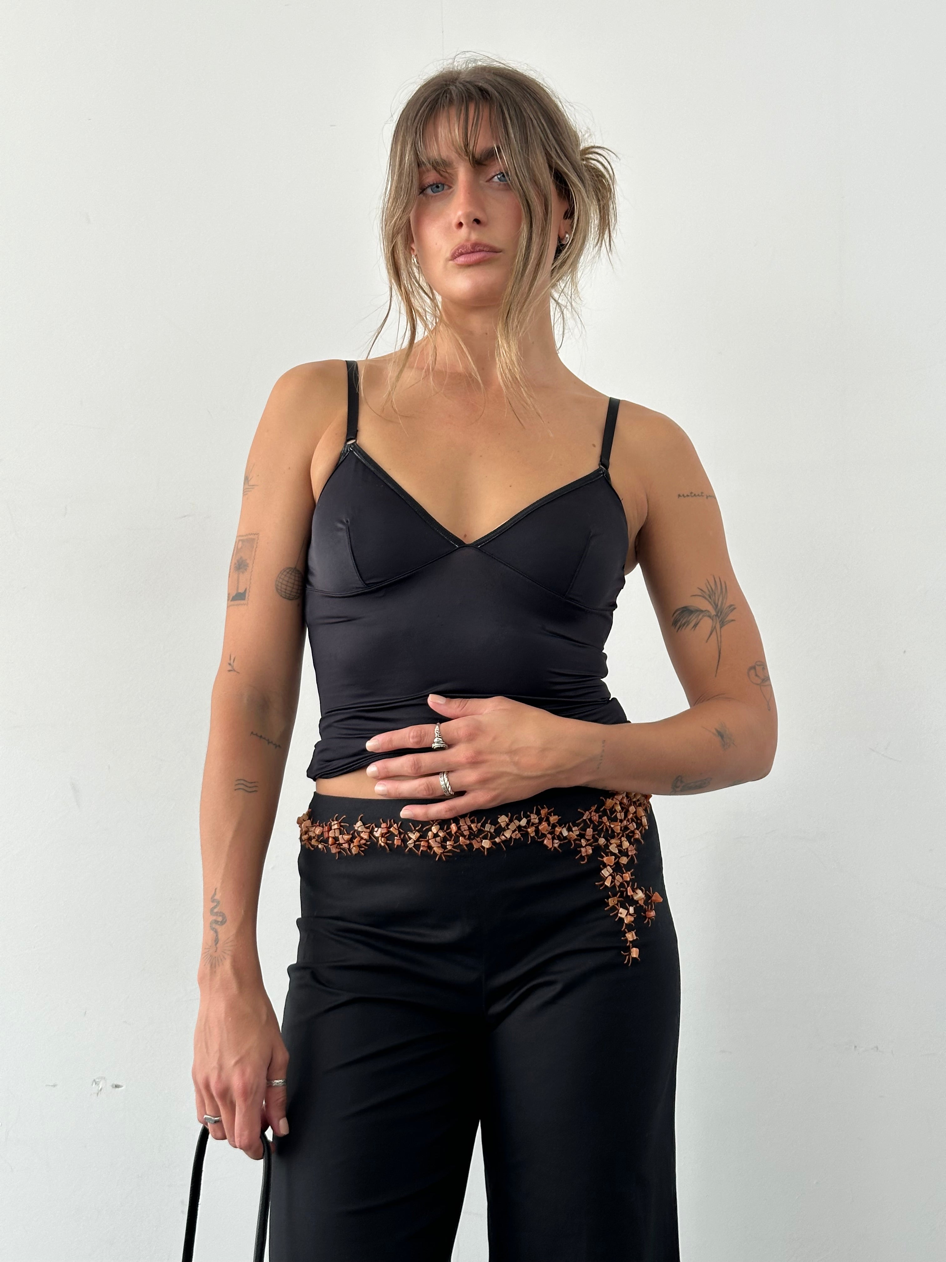 Dolce & Gabbana stretch cami top in XS/S, featuring a sleek, fitted design, shown on a flat surface with subtle fabric details.