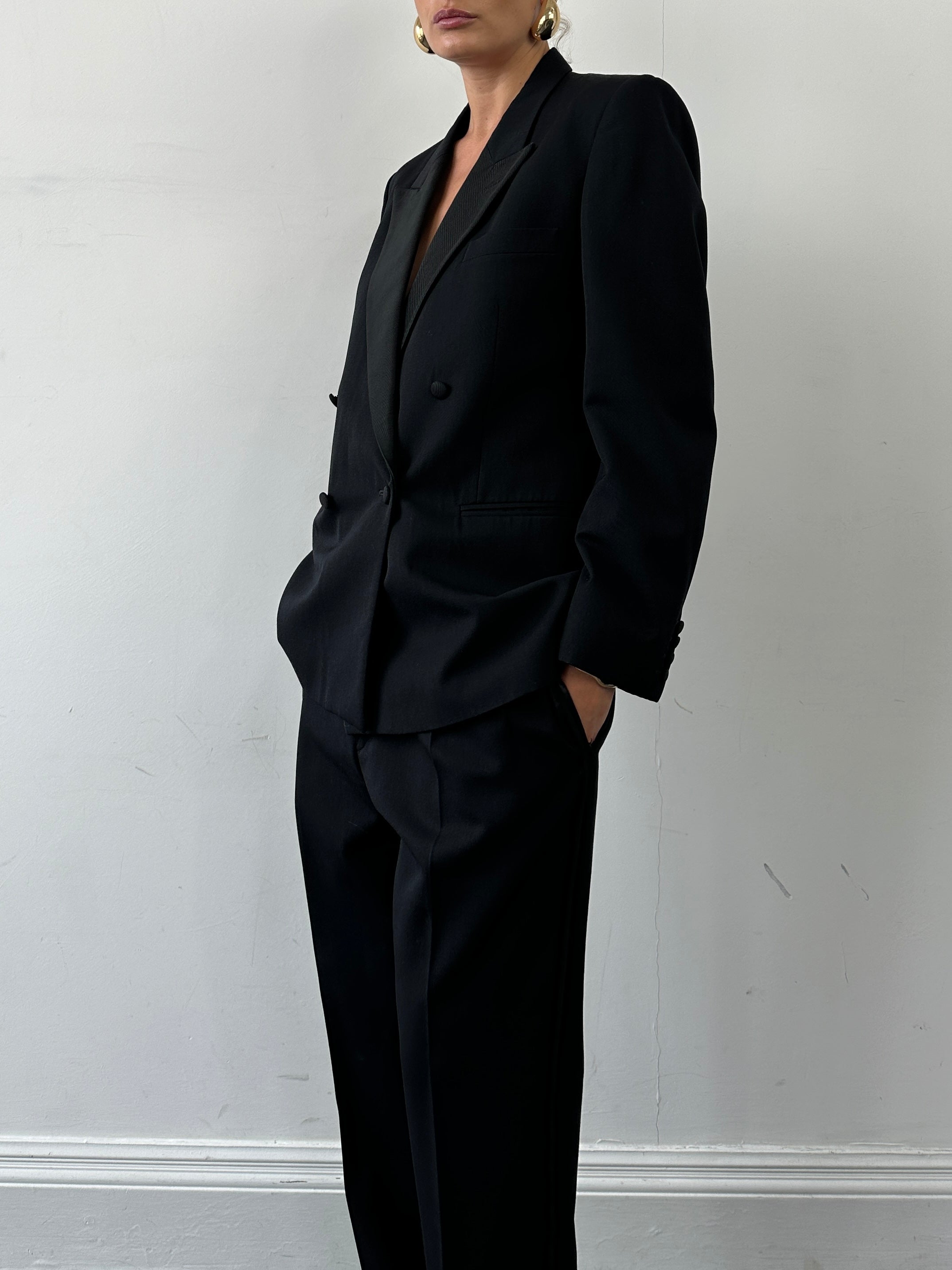 Christian Dior Monsieur tuxedo jumpsuit, double-breasted style in size 42S/W34, tailored fit with classic lapel details.