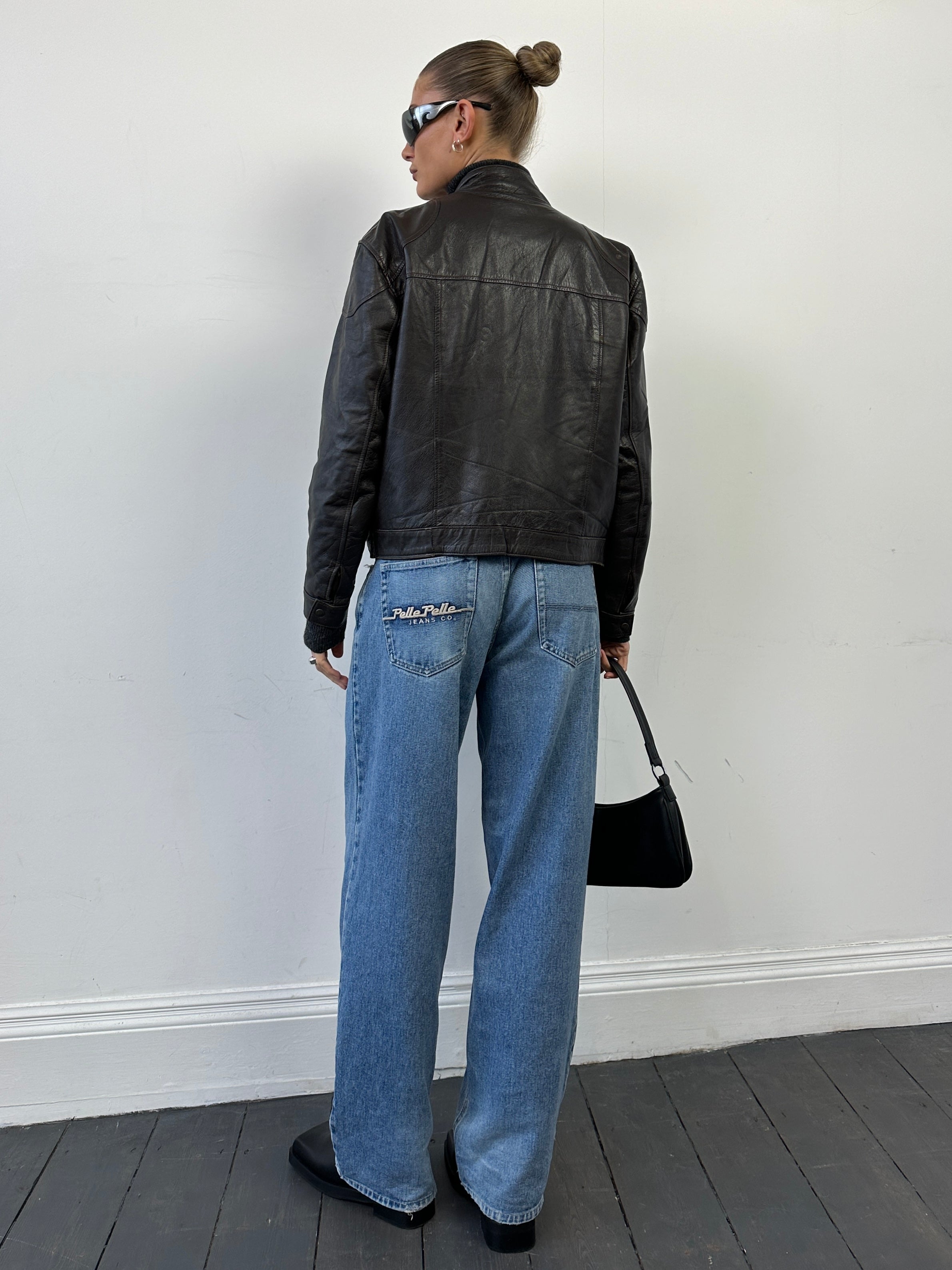 Italian Vintage Moto Leather Jacket in size S, featuring classic design, premium leather material, and vintage style details.