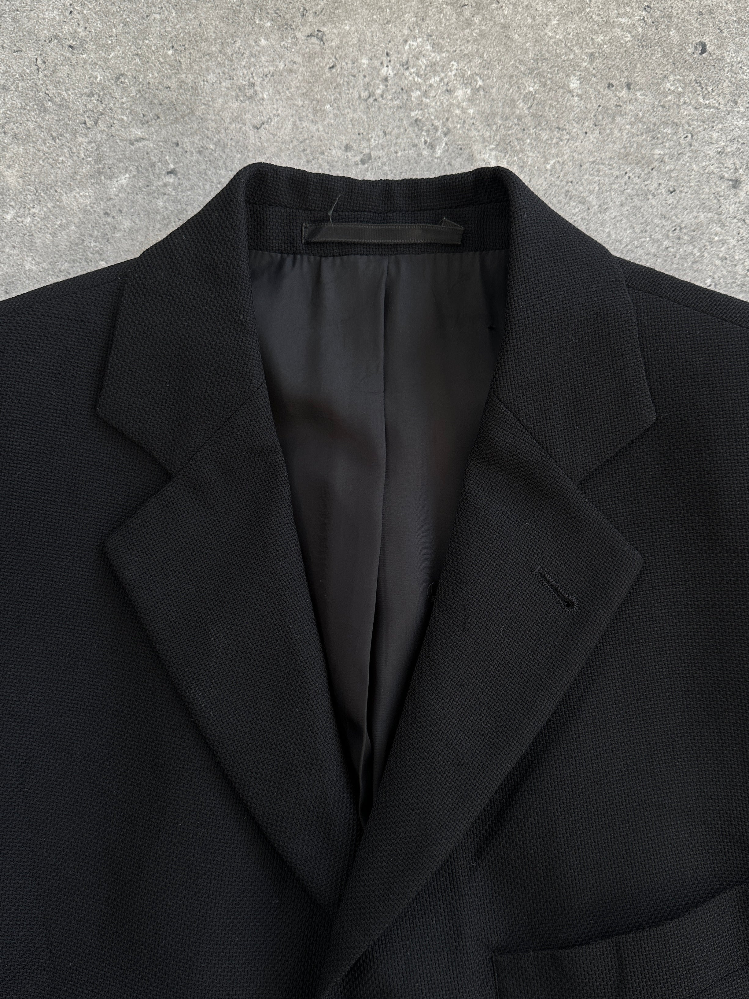 Hugo Boss x Loro Piana pure wool single-breasted blazer in size 38R/M, tailored fit, in a classic dark color.