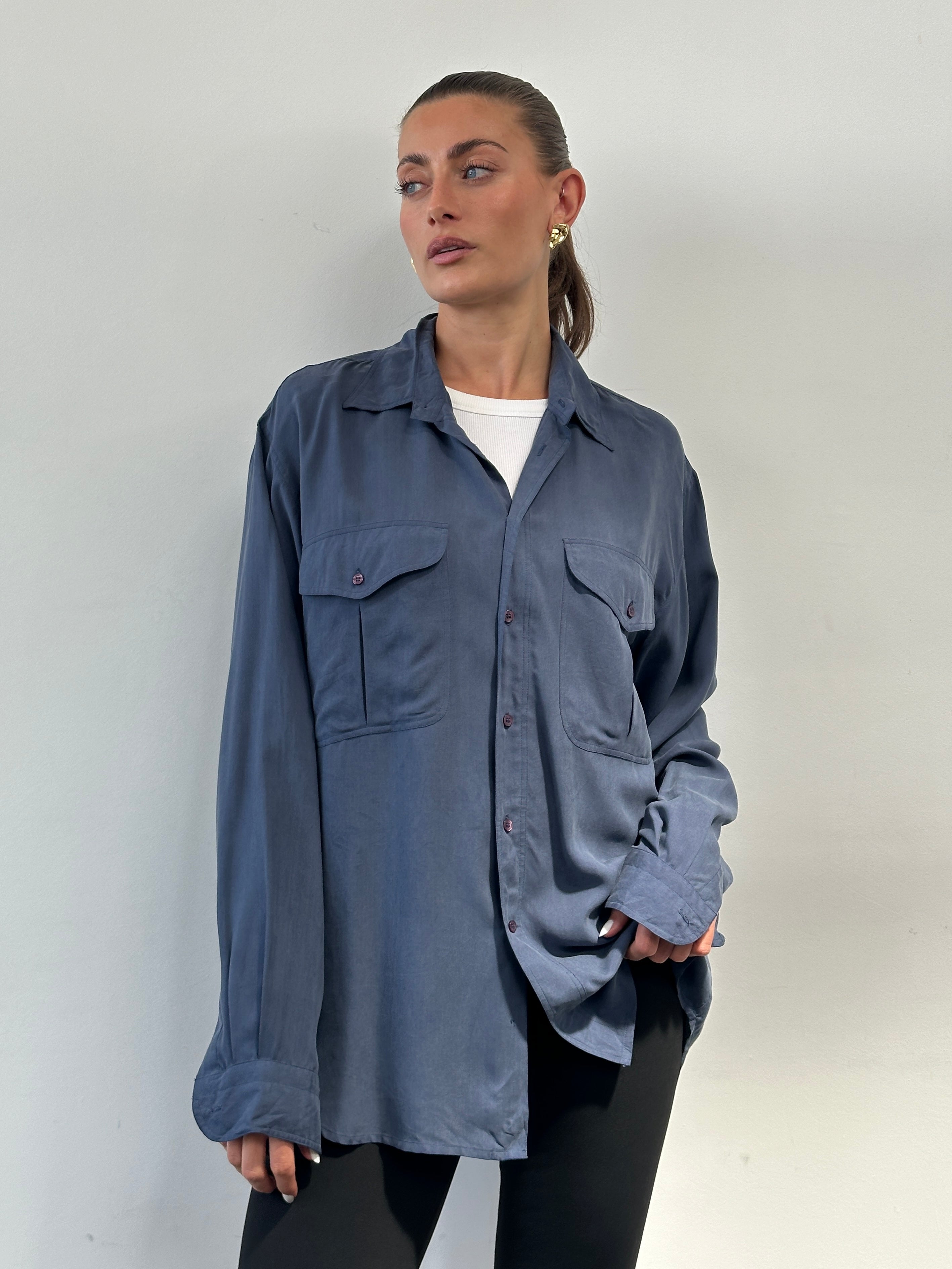Vintage pure silk shirt in size XL, featuring a classic design with a smooth, shiny fabric and a tailored fit.
