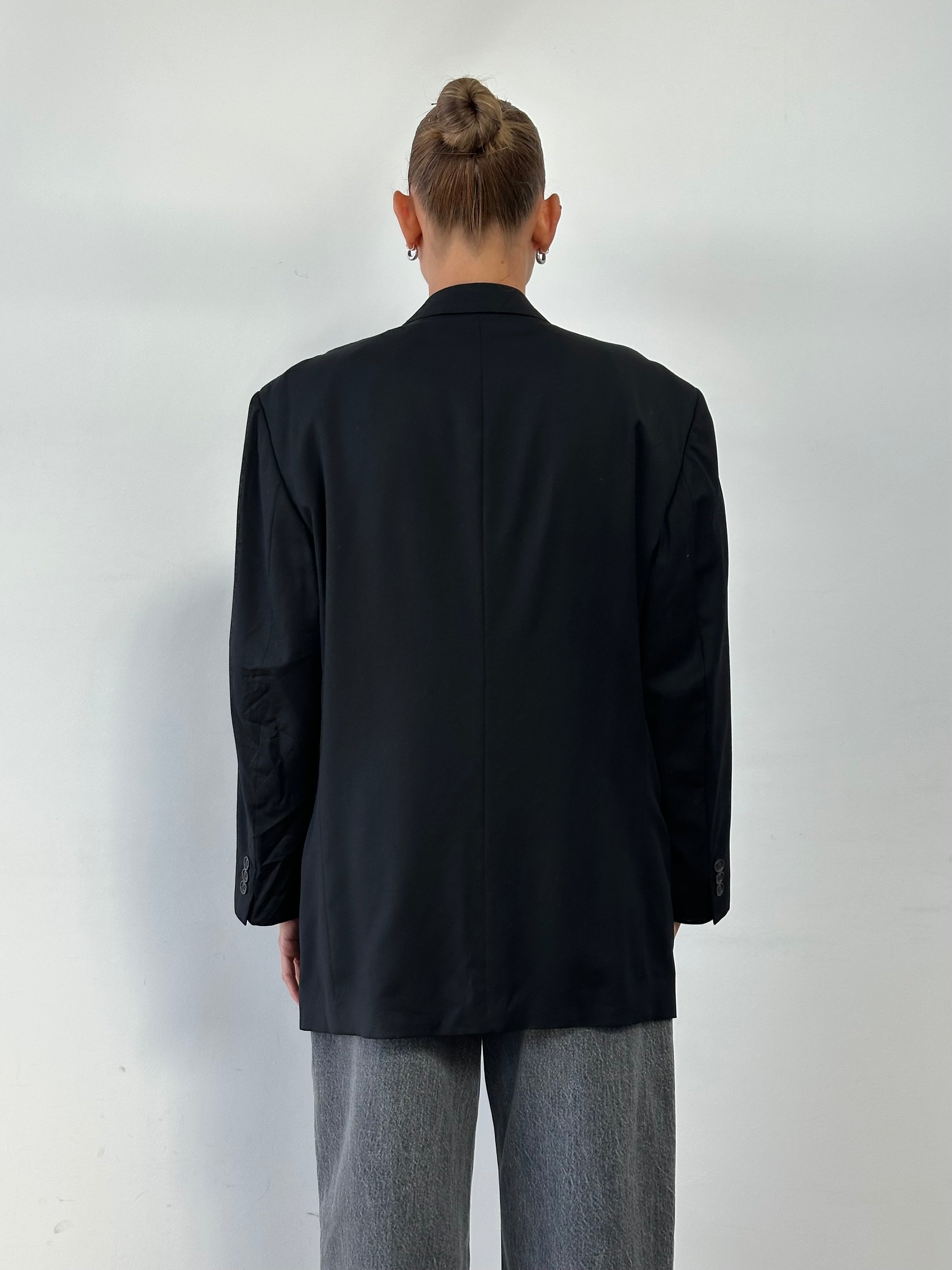 Yves Saint Laurent 90s pure wool single-breasted blazer in size 44R/L, tailored fit with classic lapels and structured design.