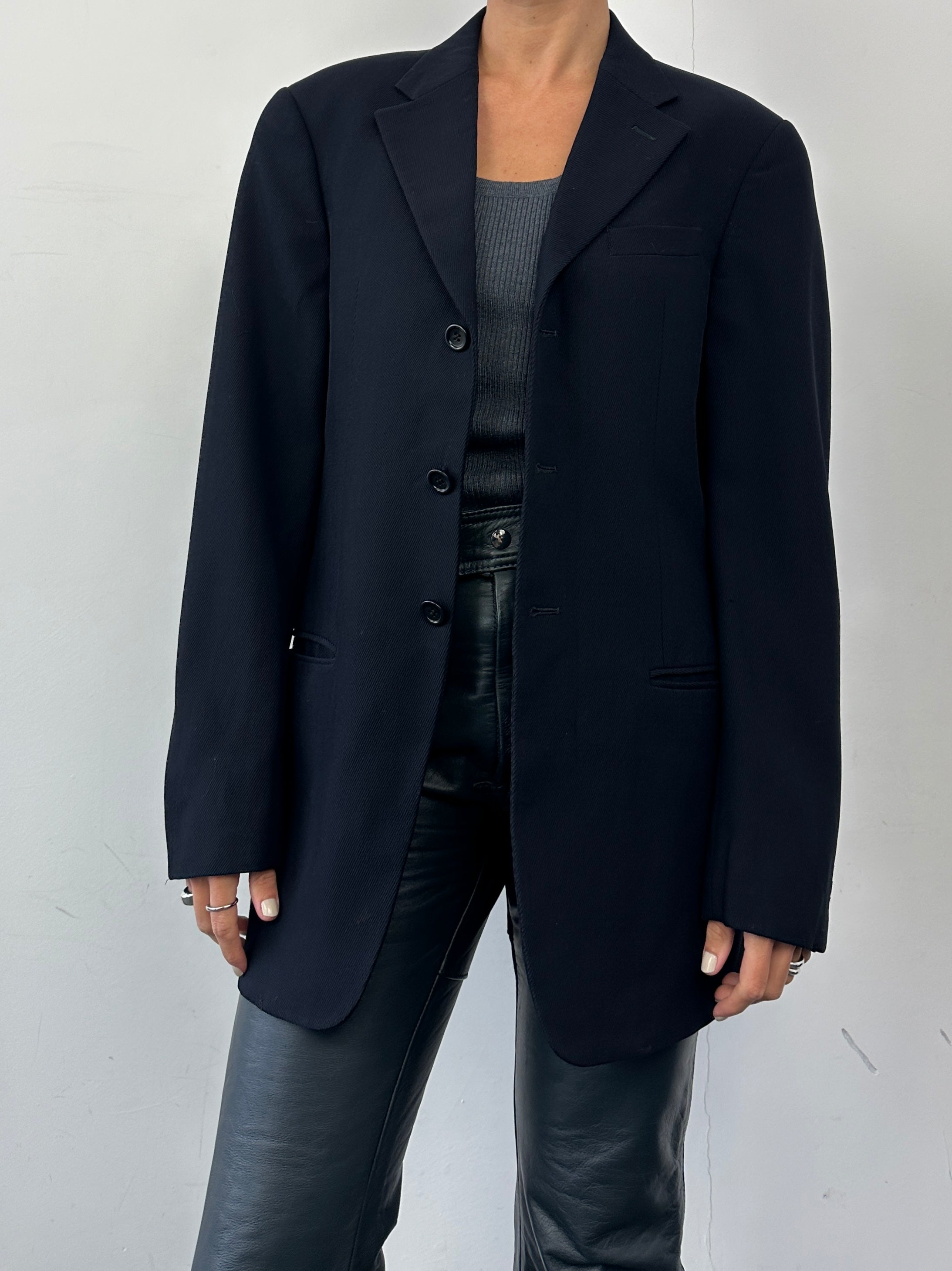 Armani Collezioni pure wool ribbed single-breasted blazer in size 38R/M, navy blue, tailored fit with notch lapel.