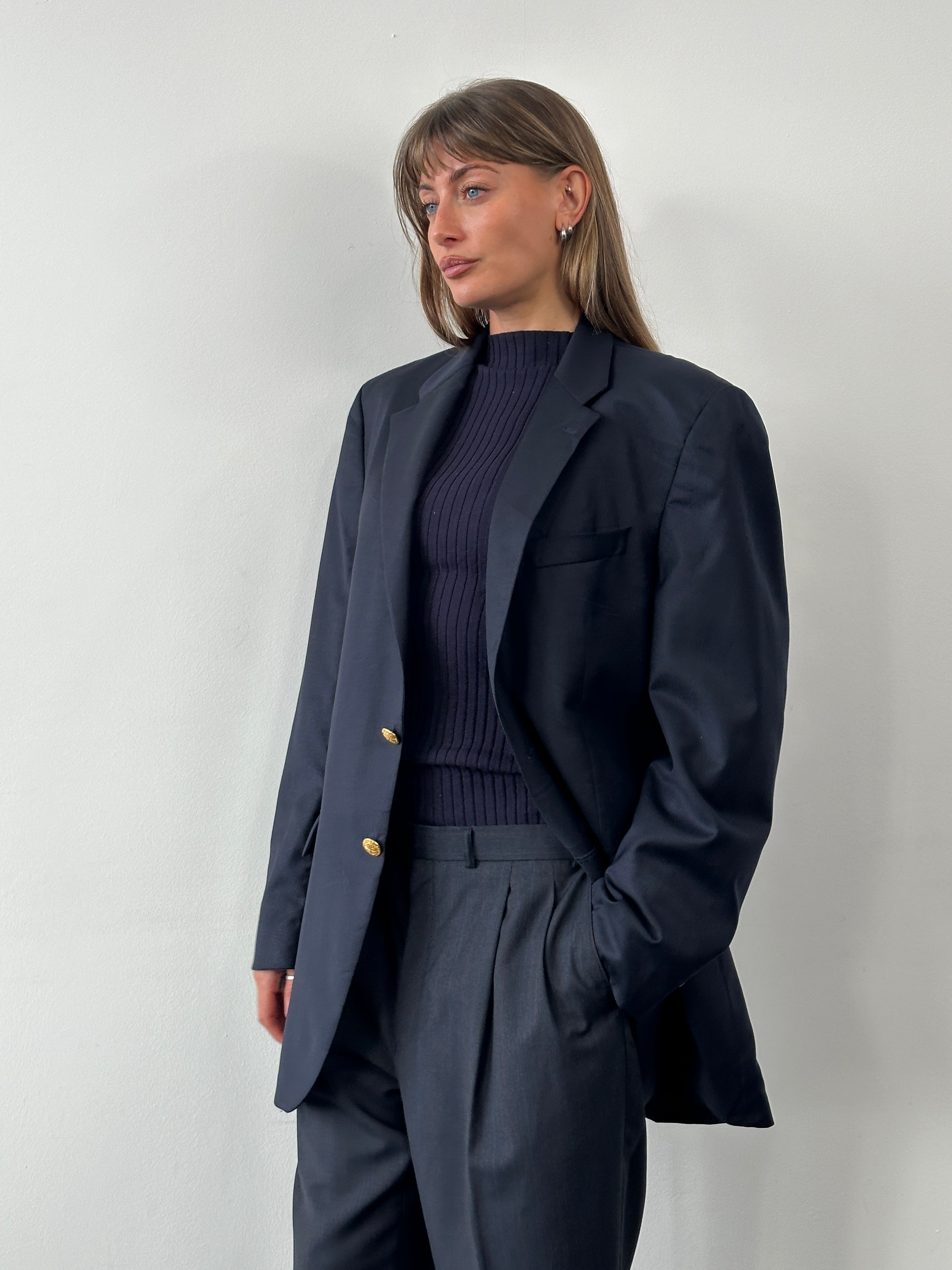 Ralph Lauren 1990s pure wool bespoke button blazer in size 40L/XL, tailored fit with classic lapels, dark navy color.
