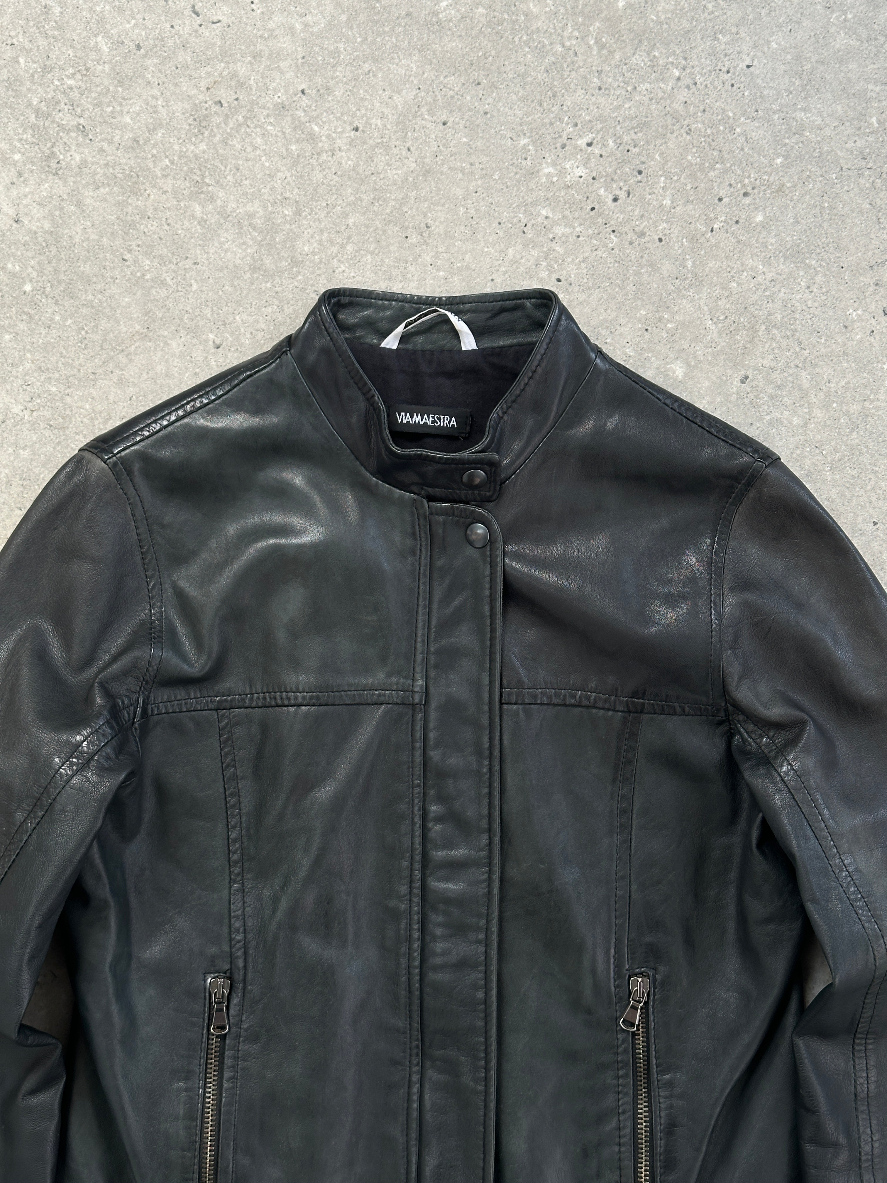 Vintage Italian double zip fitted leather jacket, stylish design, showcasing the classic leather texture and silver hardware.