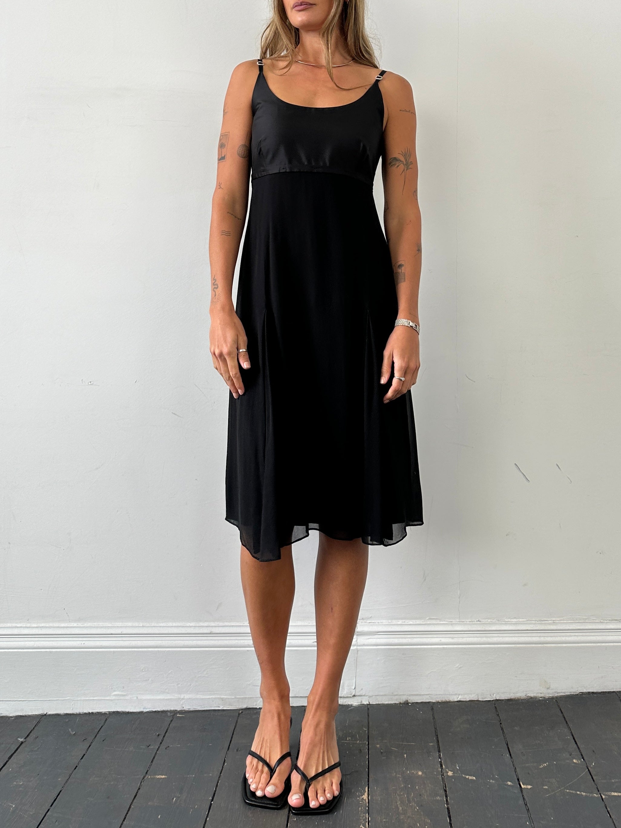 Max Mara pure silk pleated midi dress in soft fabric, shown with elegant draping and a classic silhouette.